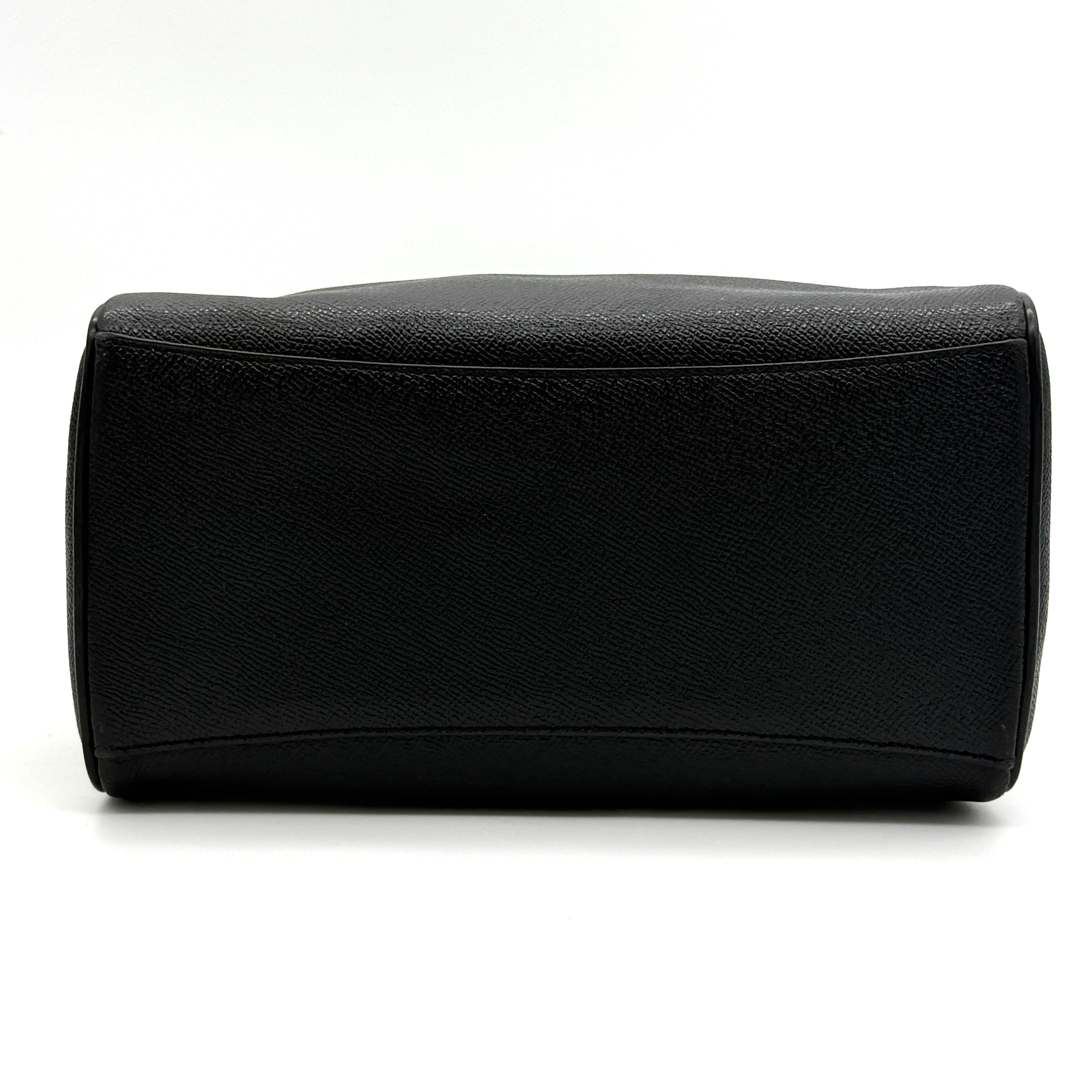 Front-facing image of the Coach Mini Bennett Boston Bag in black grained leather with gold hardware.