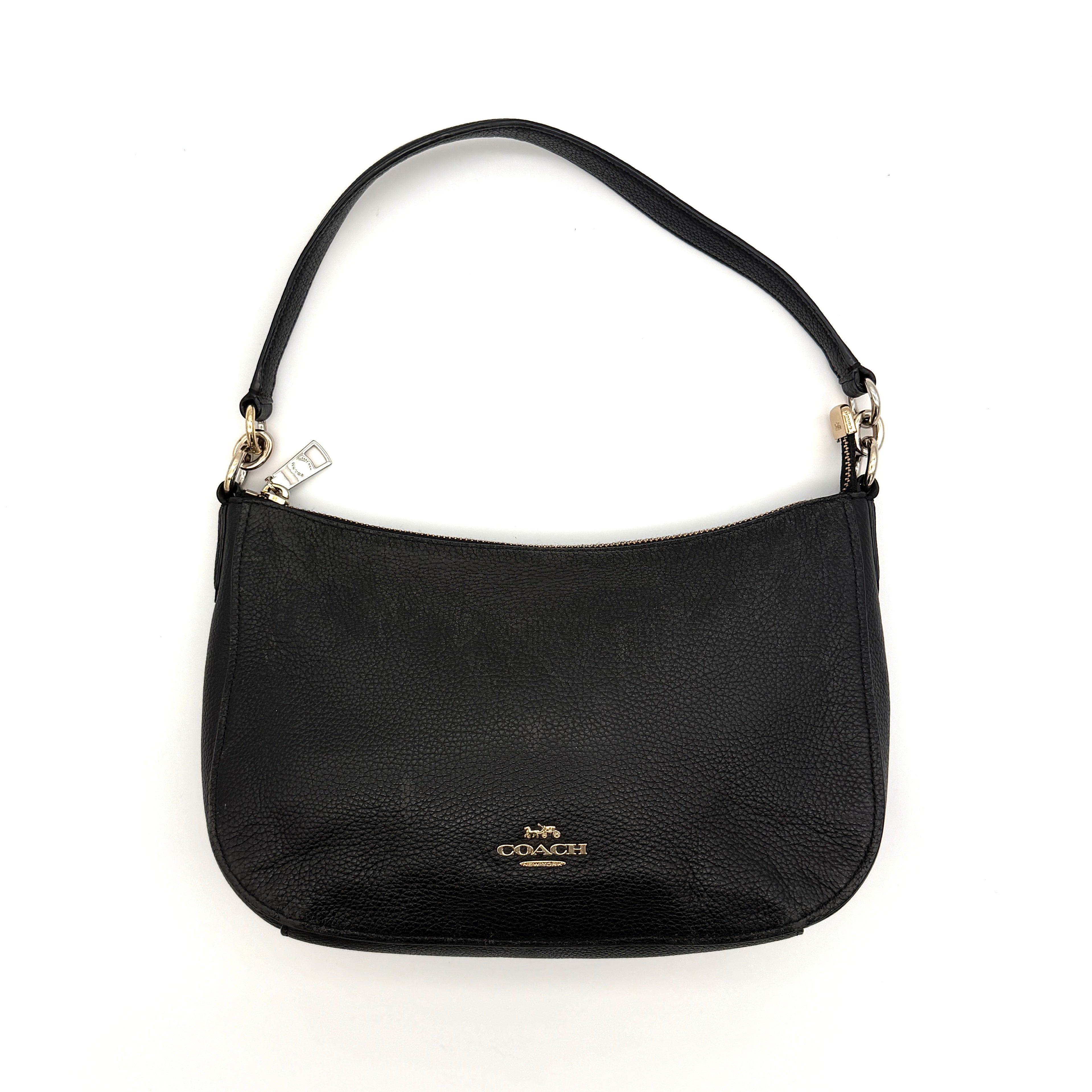 Coach Sutton Hobo Shoulder Bag in black grained leather with gold-tone hardware and zip closure.