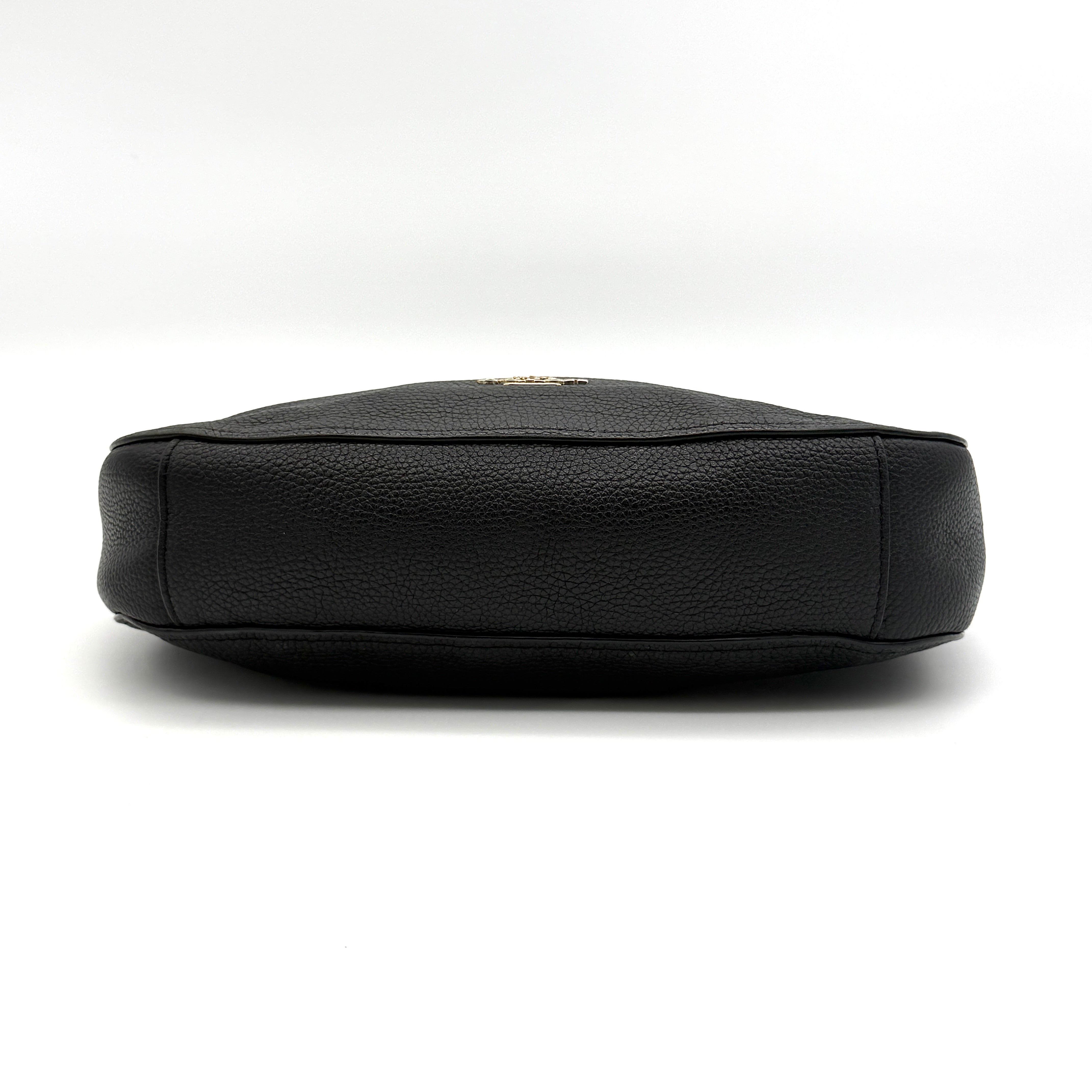 Coach Sutton Hobo Shoulder Bag in black grained leather with gold-tone hardware and zip closure.