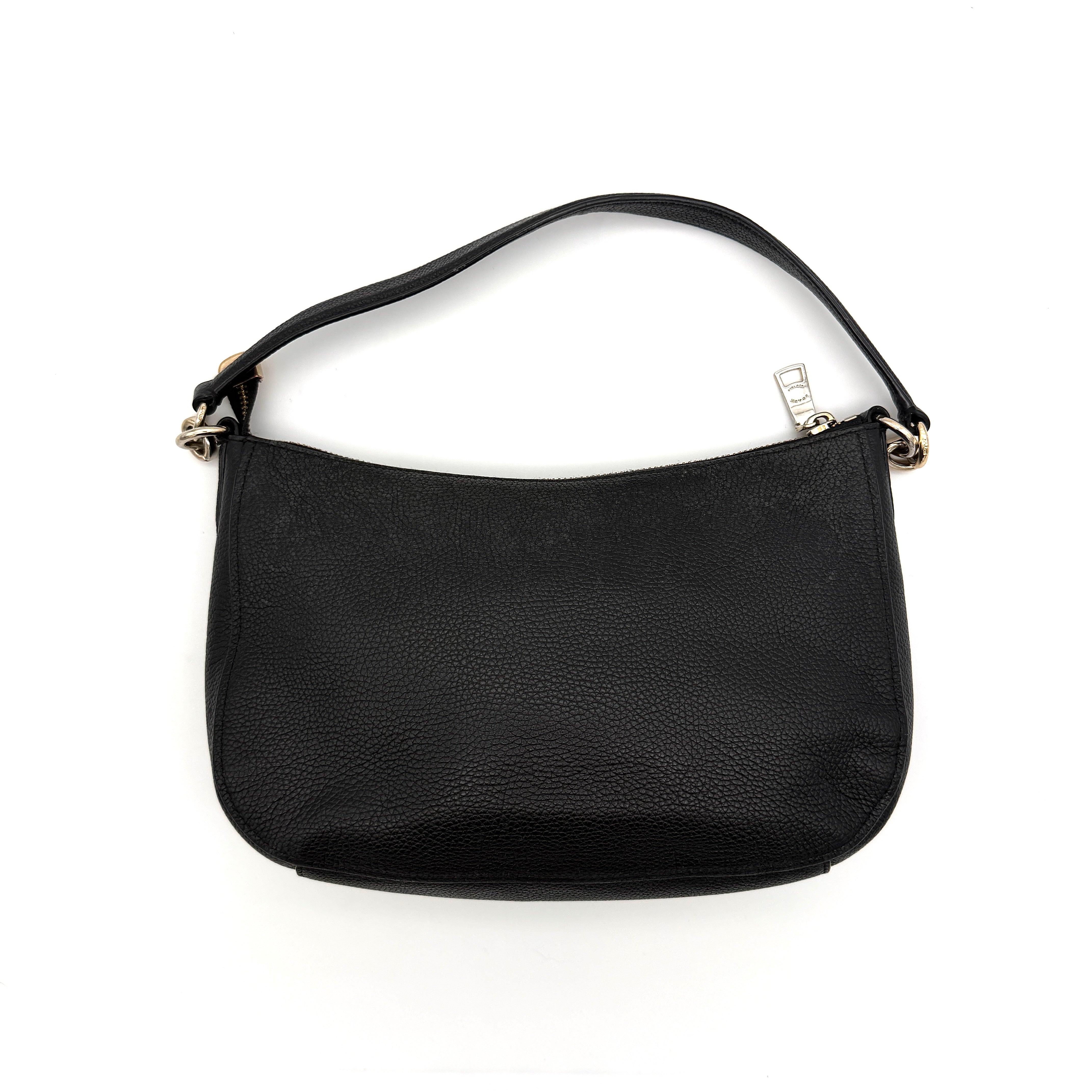 Coach Sutton Hobo Shoulder Bag in black grained leather with gold-tone hardware and zip closure.