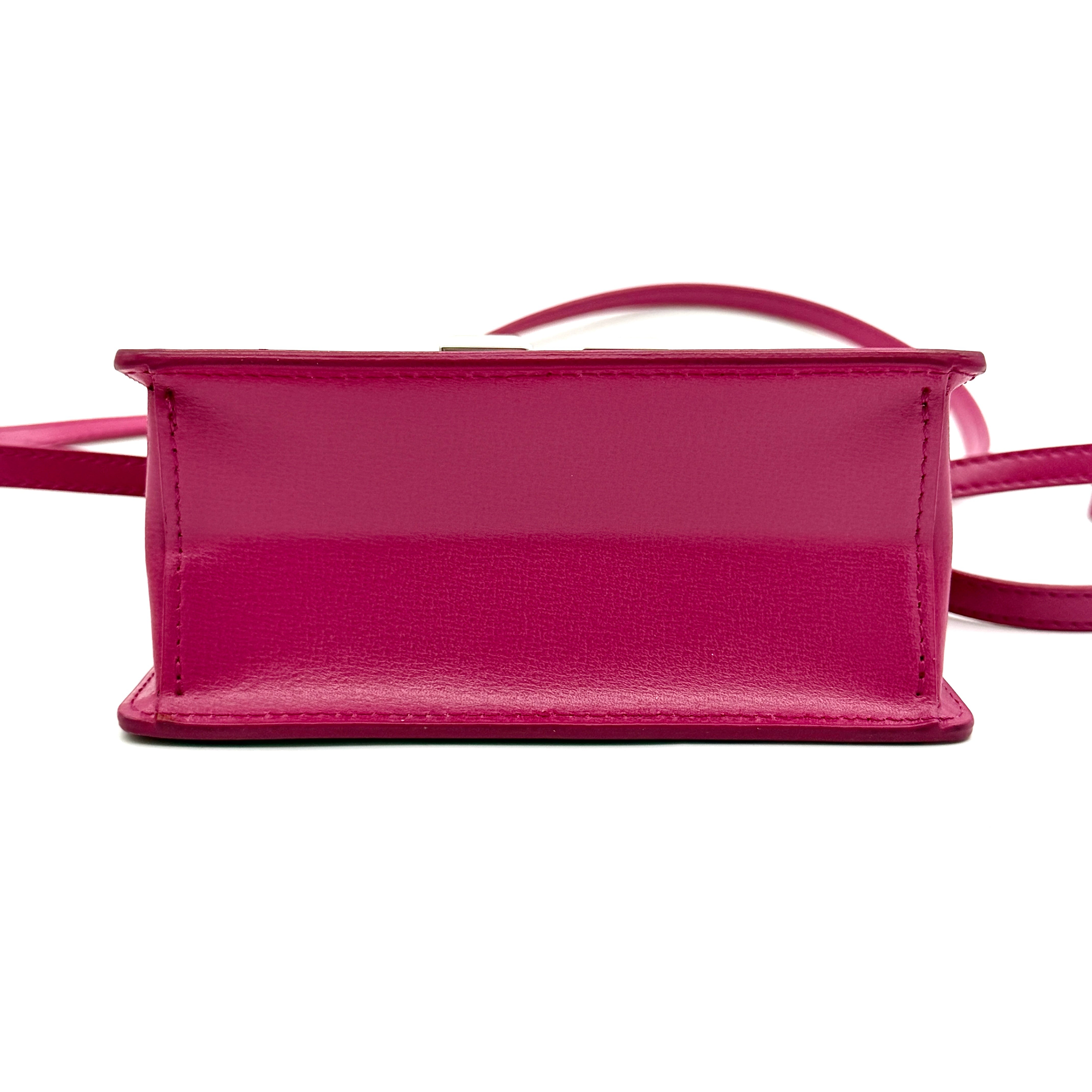 Off-White Jitney 0.7 Crossbody Bag in pink leather with silver-tone arrow logo and adjustable strap, shown against a white background.