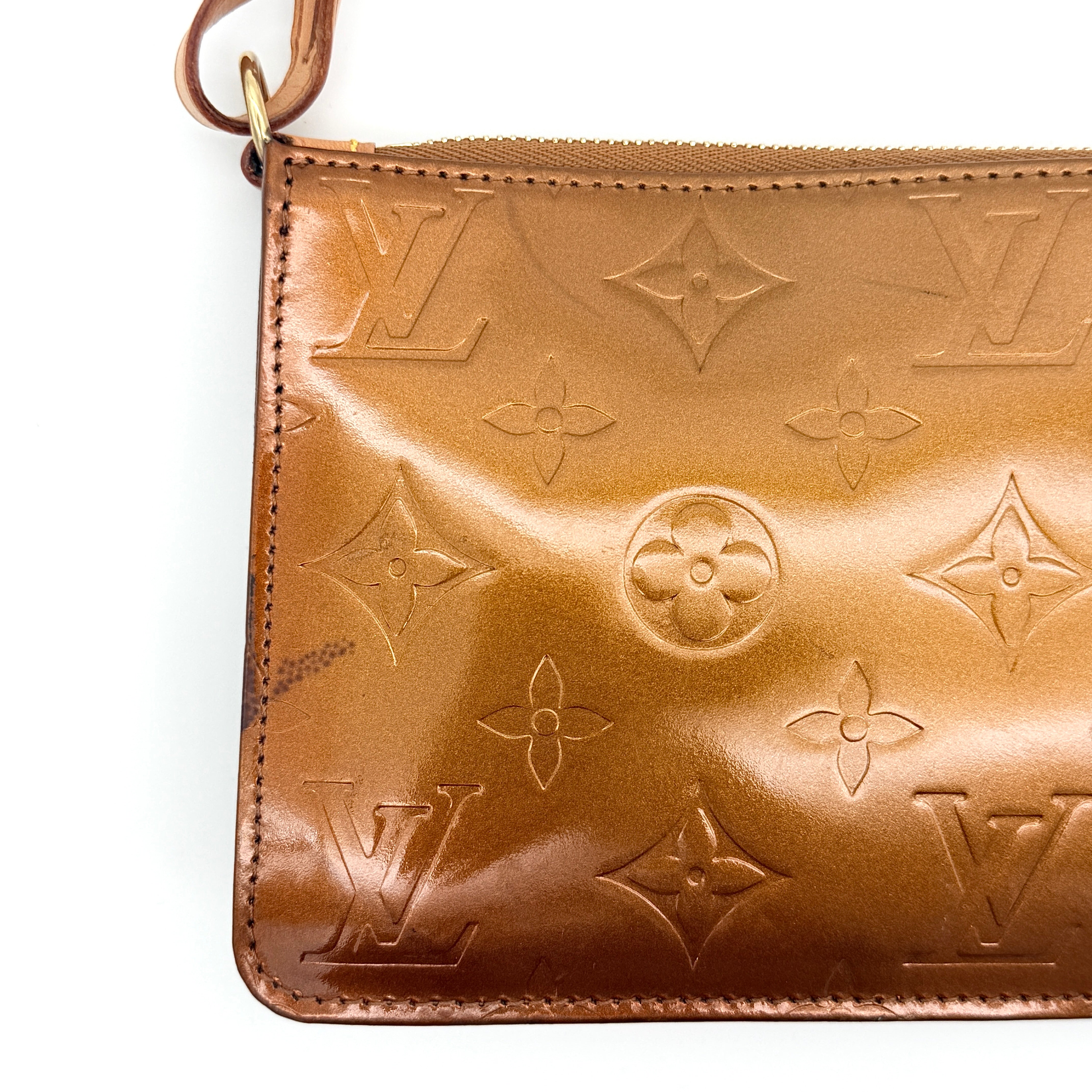 Louis Vuitton Monogram Lexington Vernis Pochette in bronze patent leather, shown with its gold-tone hardware and monogram embossing.