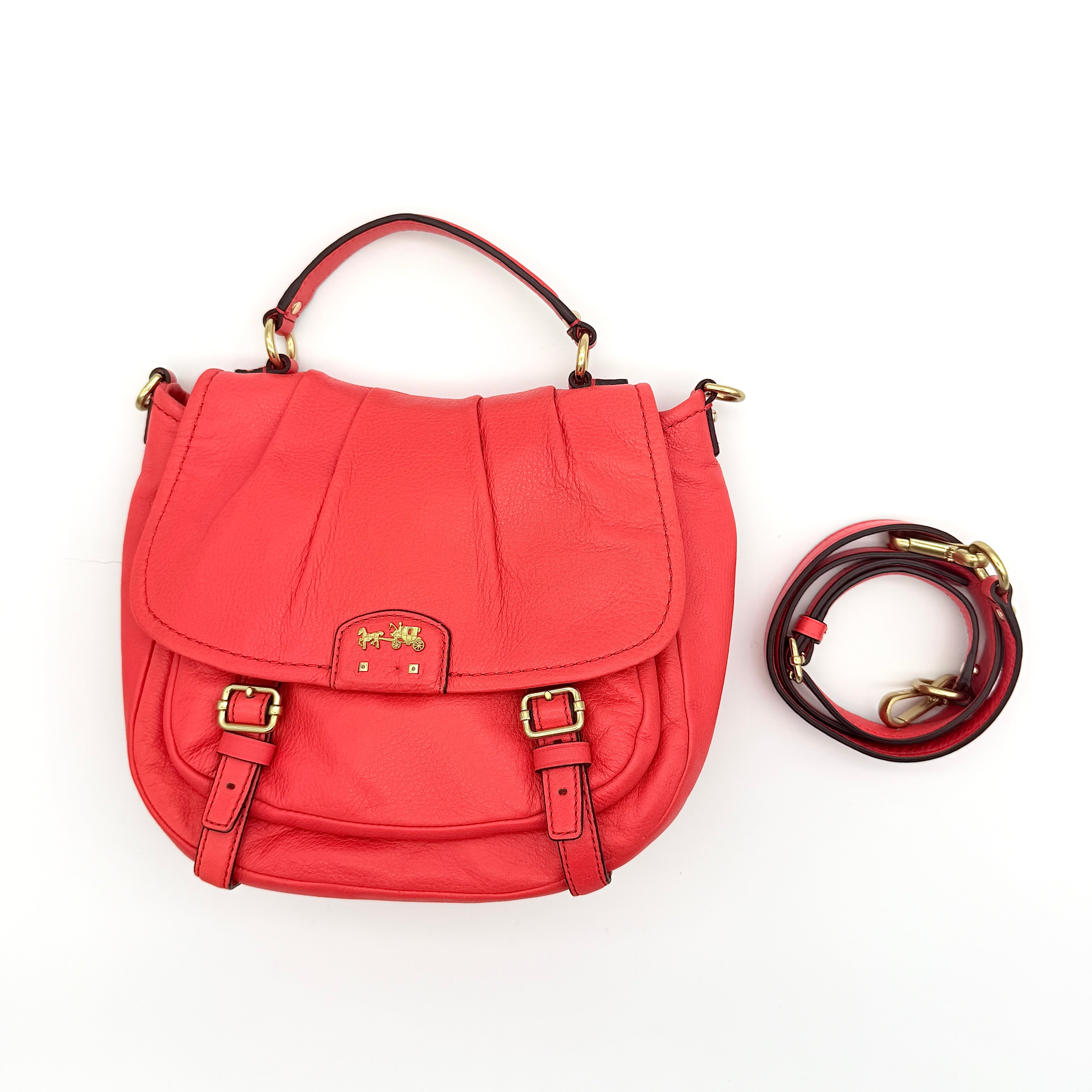 Coach Madison Anabelle red leather handbag with gold tone hardware, top handle, and detachable strap displayed on a white background