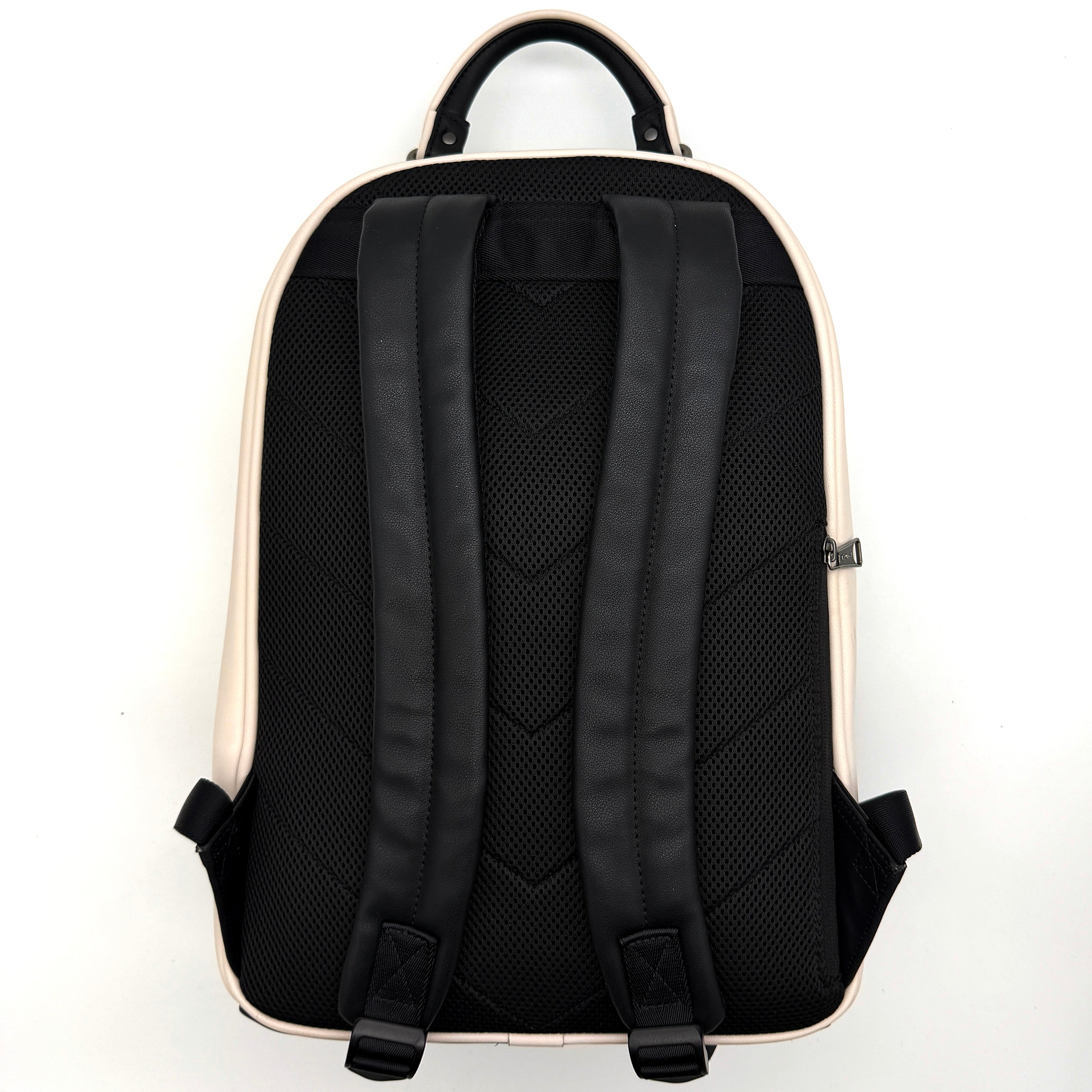 Diesel D-Logo Colorblock Backpack in black and white faux leather with a red logo patch and silver-tone hardware.