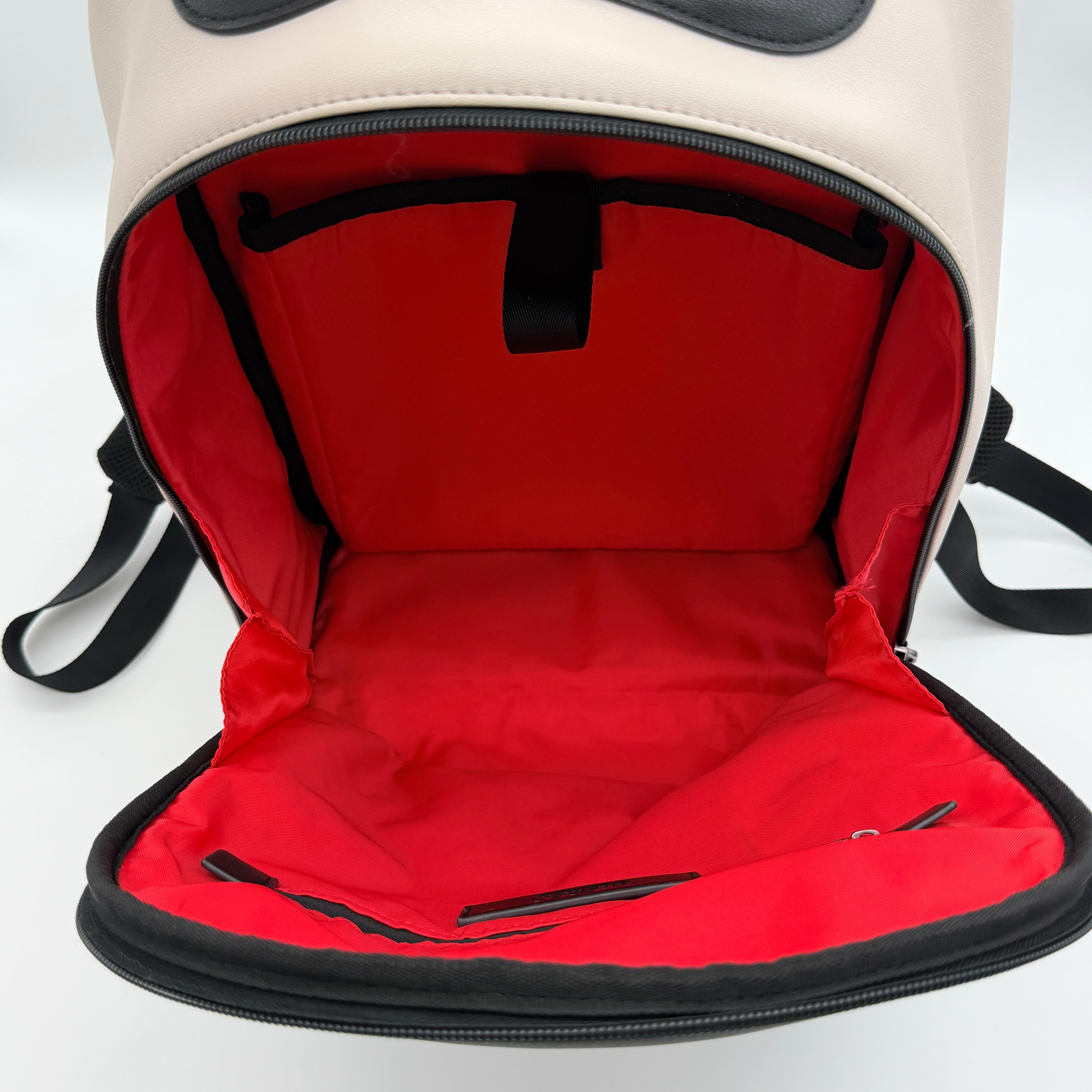 Diesel D-Logo Colorblock Backpack in black and white faux leather with a red logo patch and silver-tone hardware.