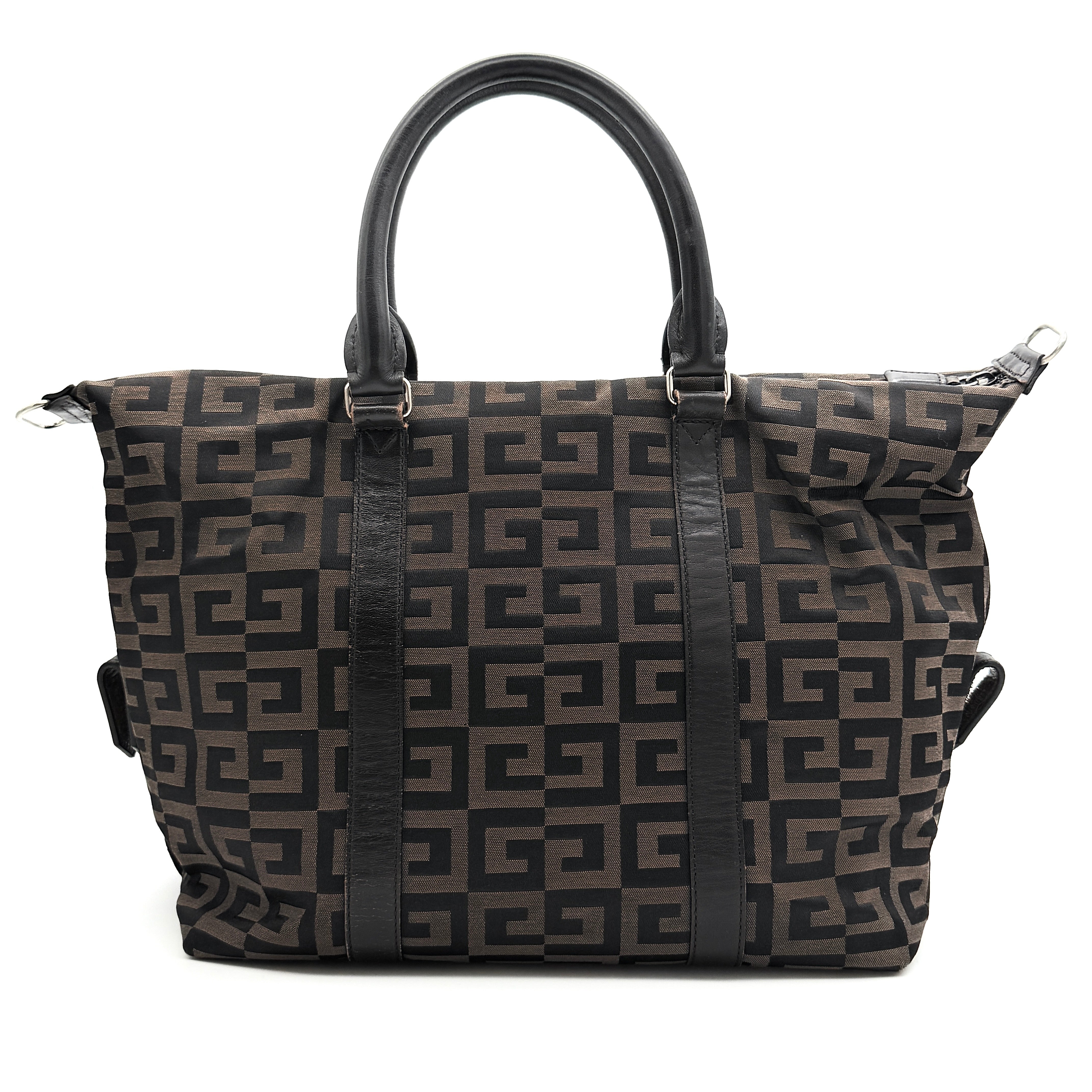 Givenchy 4G Monogram Handbag in brown and black fabric with leather handles and bold graphic pattern.