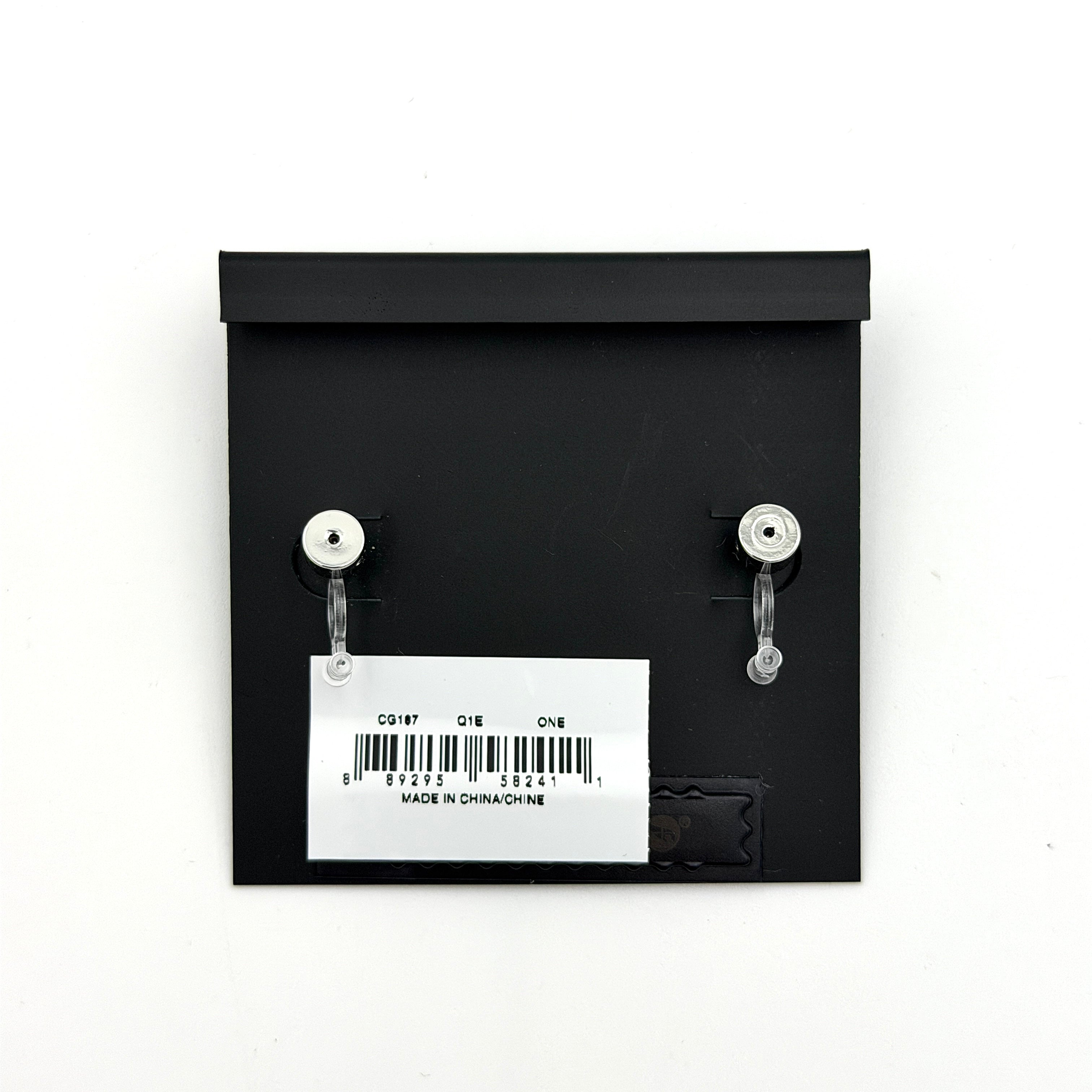 A pair of Coach heart-shaped crystal stud earrings in silver-tone metal with engraved logo and faceted stones.