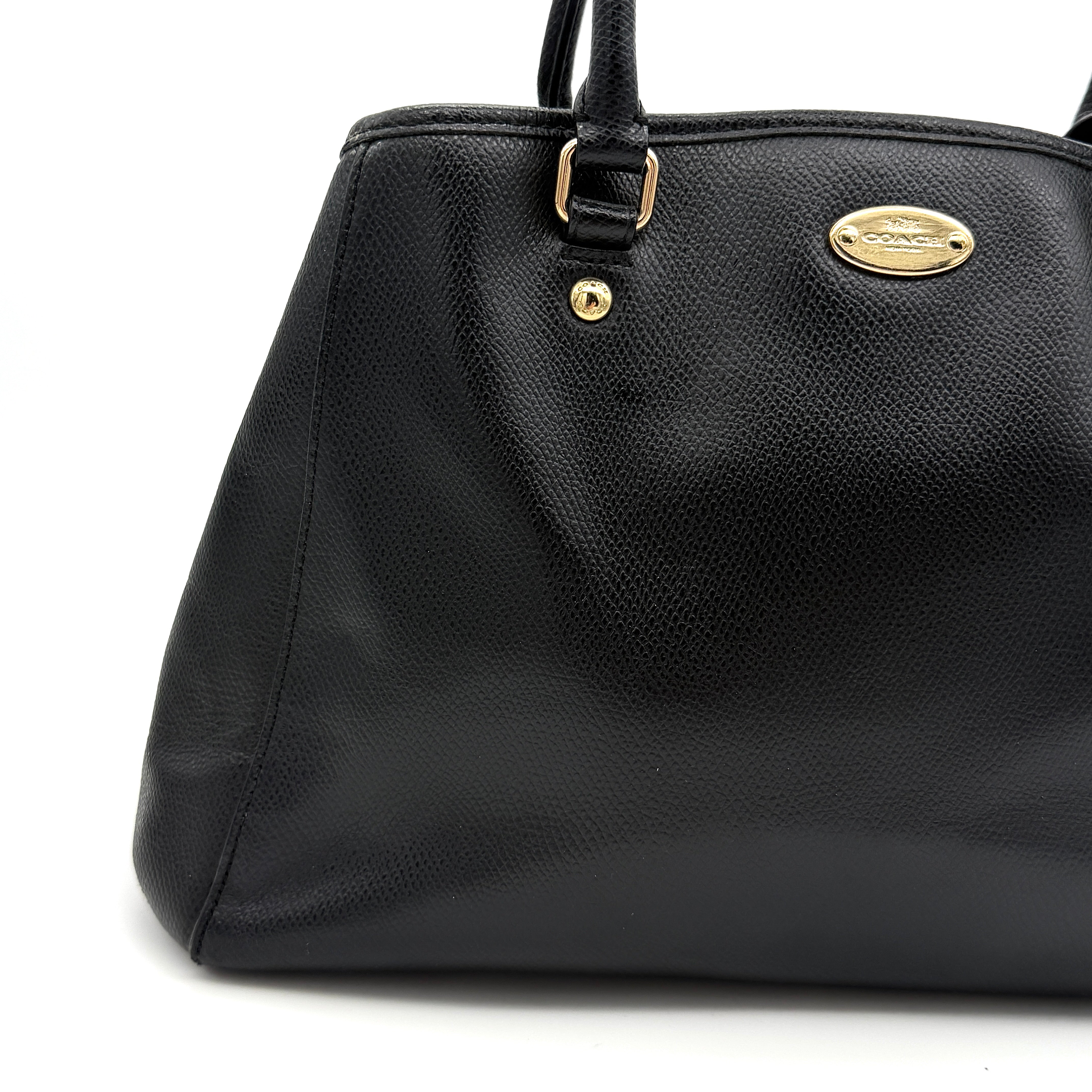 Coach 2Way Margot Carryall Handbag in black textured leather with gold-tone hardware and dual top handles, shown with detachable strap.