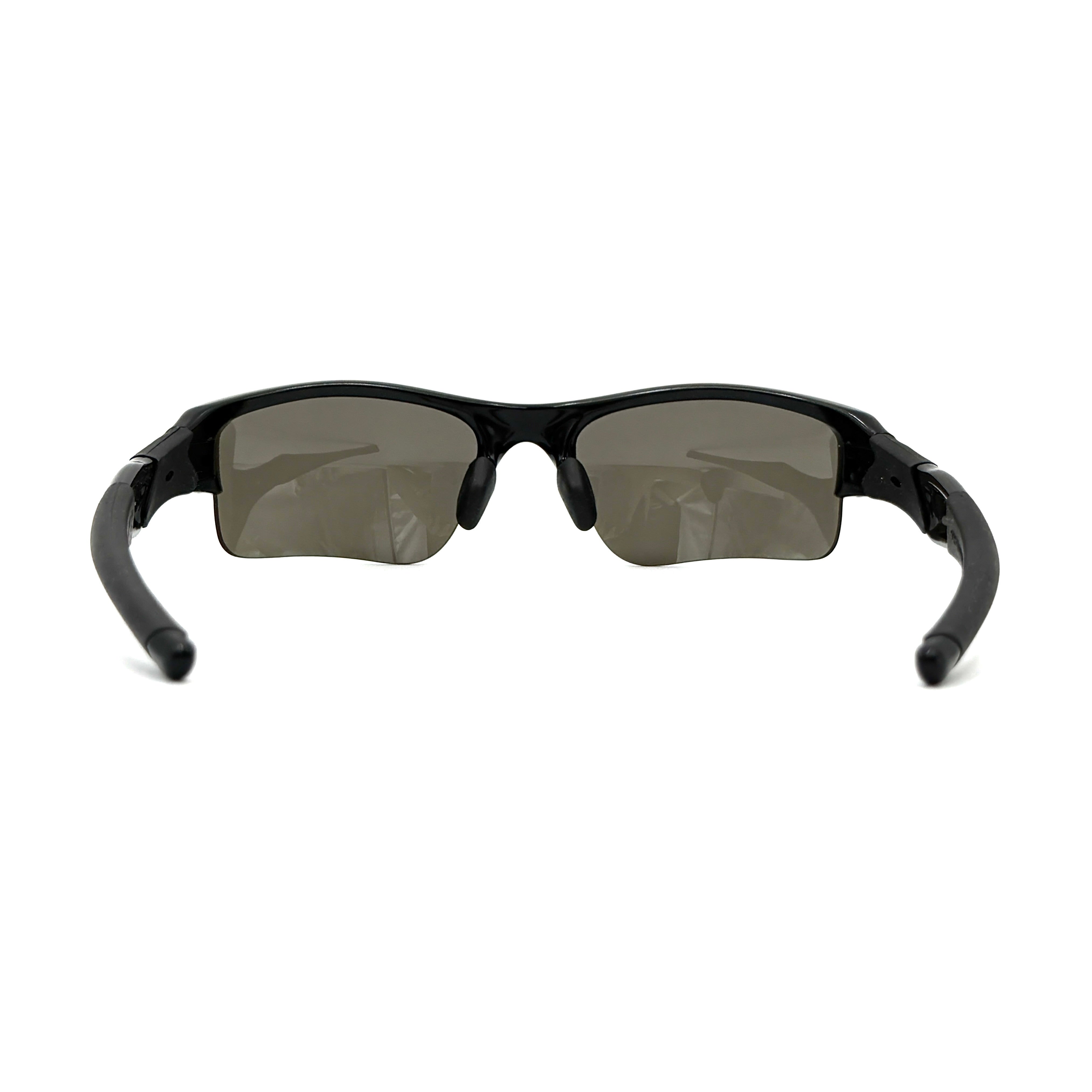 Oakley FLAK Jacket 03-915 sunglasses in black with grey lenses, shown with original zip case.
