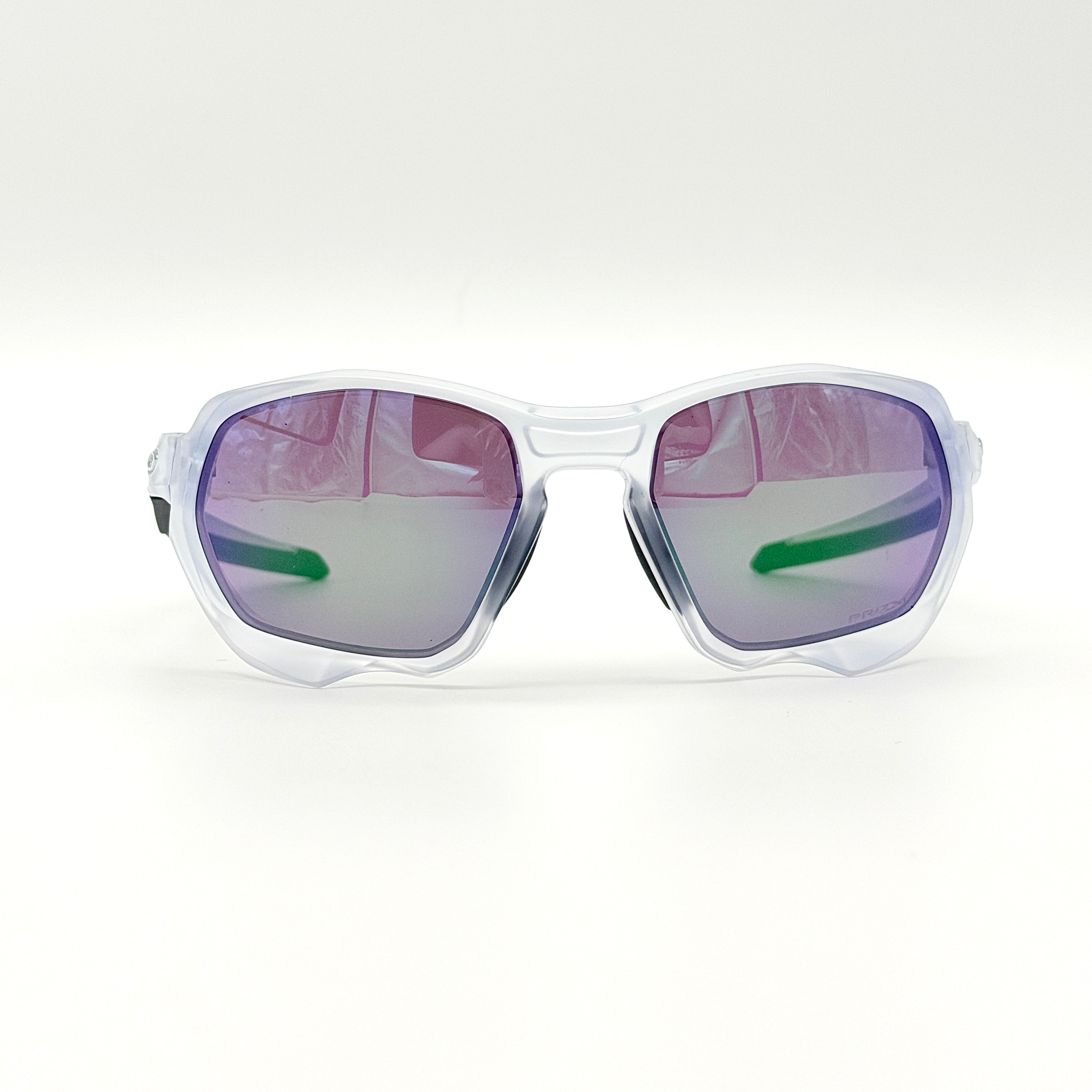 Oakley Plazma sunglasses in matte clear with Prizm Jade Road lenses, shown with original case and box.