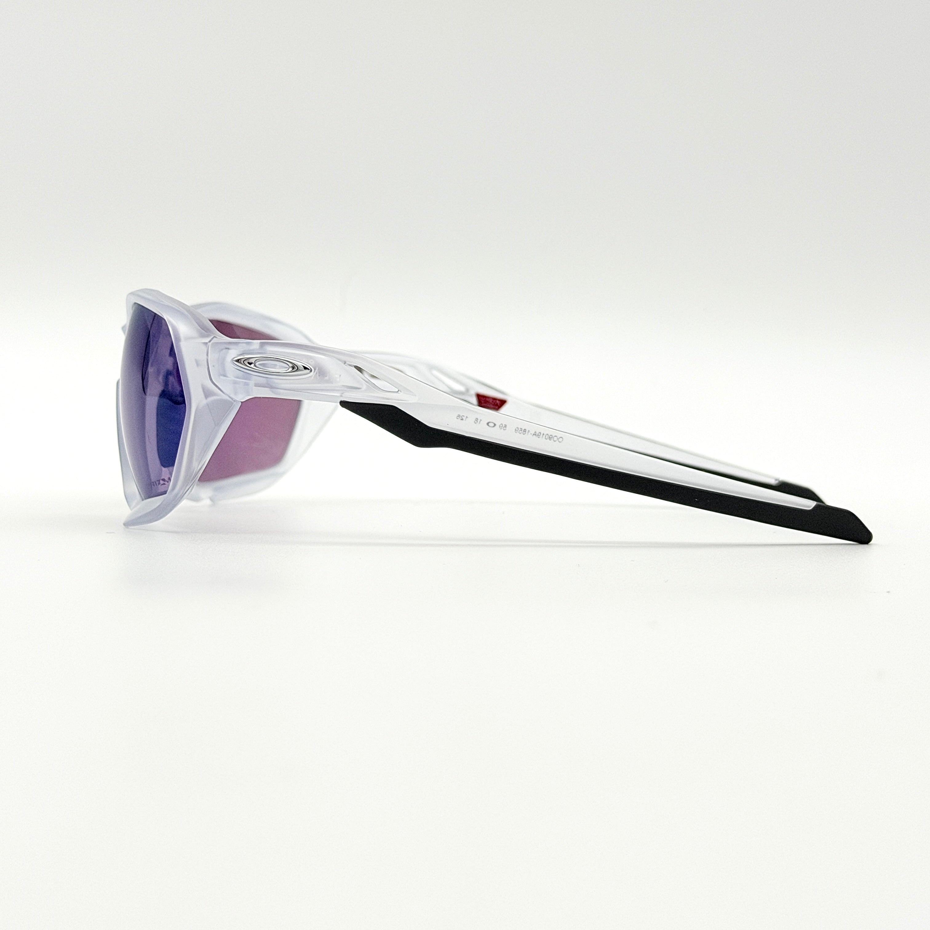 Oakley Plazma sunglasses in matte clear with Prizm Jade Road lenses, shown with original case and box.