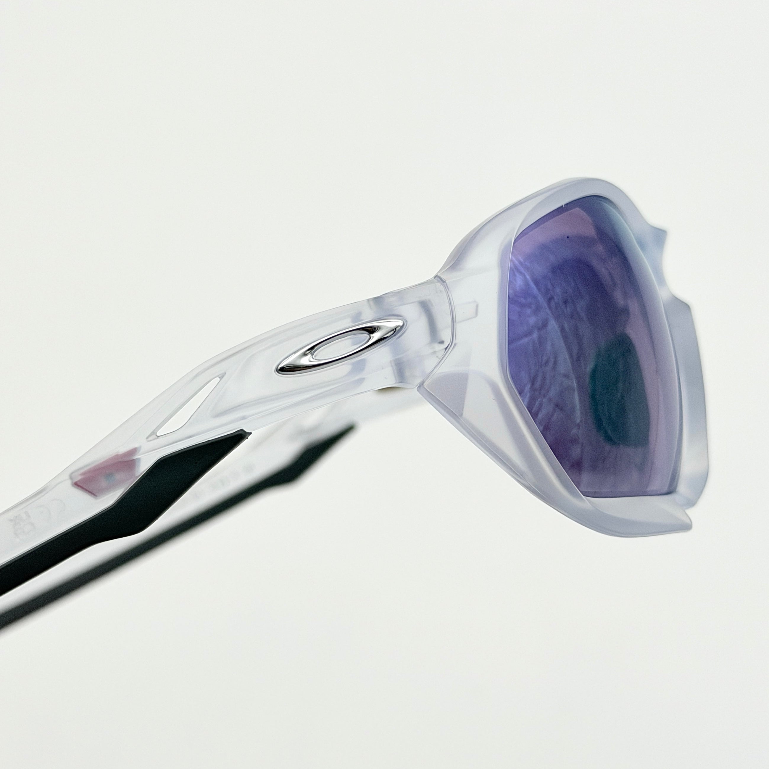Oakley Plazma sunglasses in matte clear with Prizm Jade Road lenses, shown with original case and box.