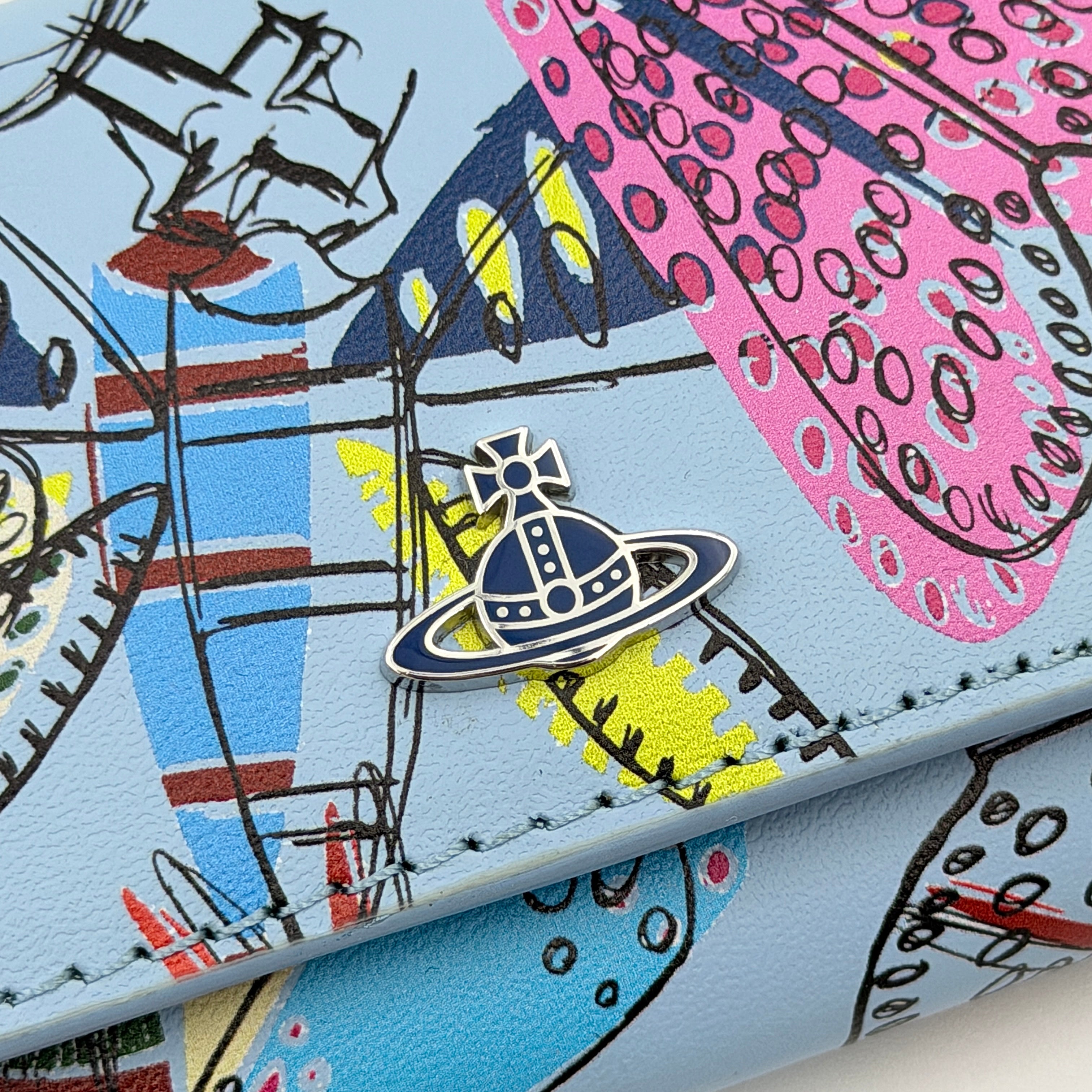 Vivienne Westwood Messy Bugs Key Holder in baby blue leather with a colourful insect motif and silver orb hardware.