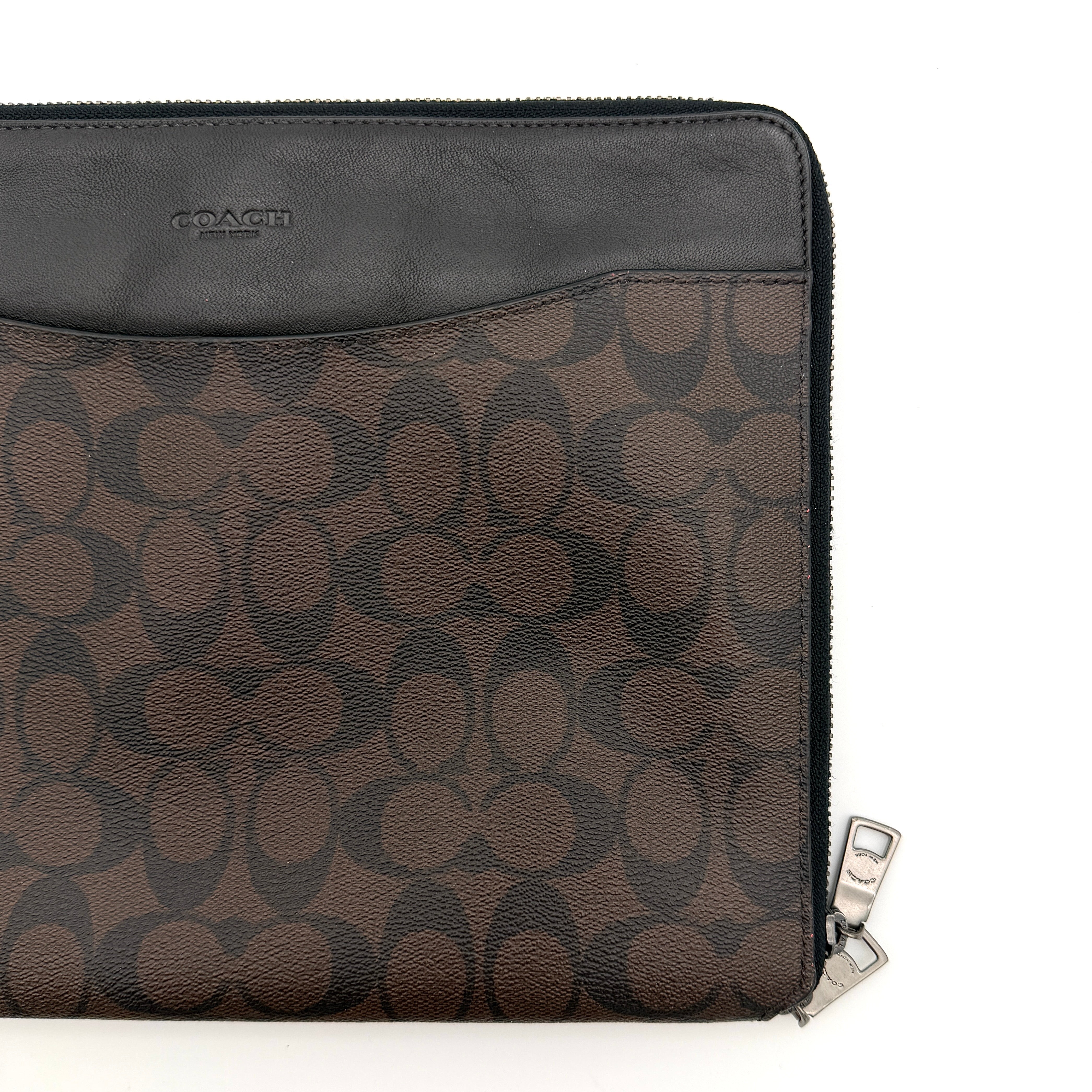Coach Signature Zip Portfolio in brown and black coated canvas with black leather trim and silver tone double zip closure.