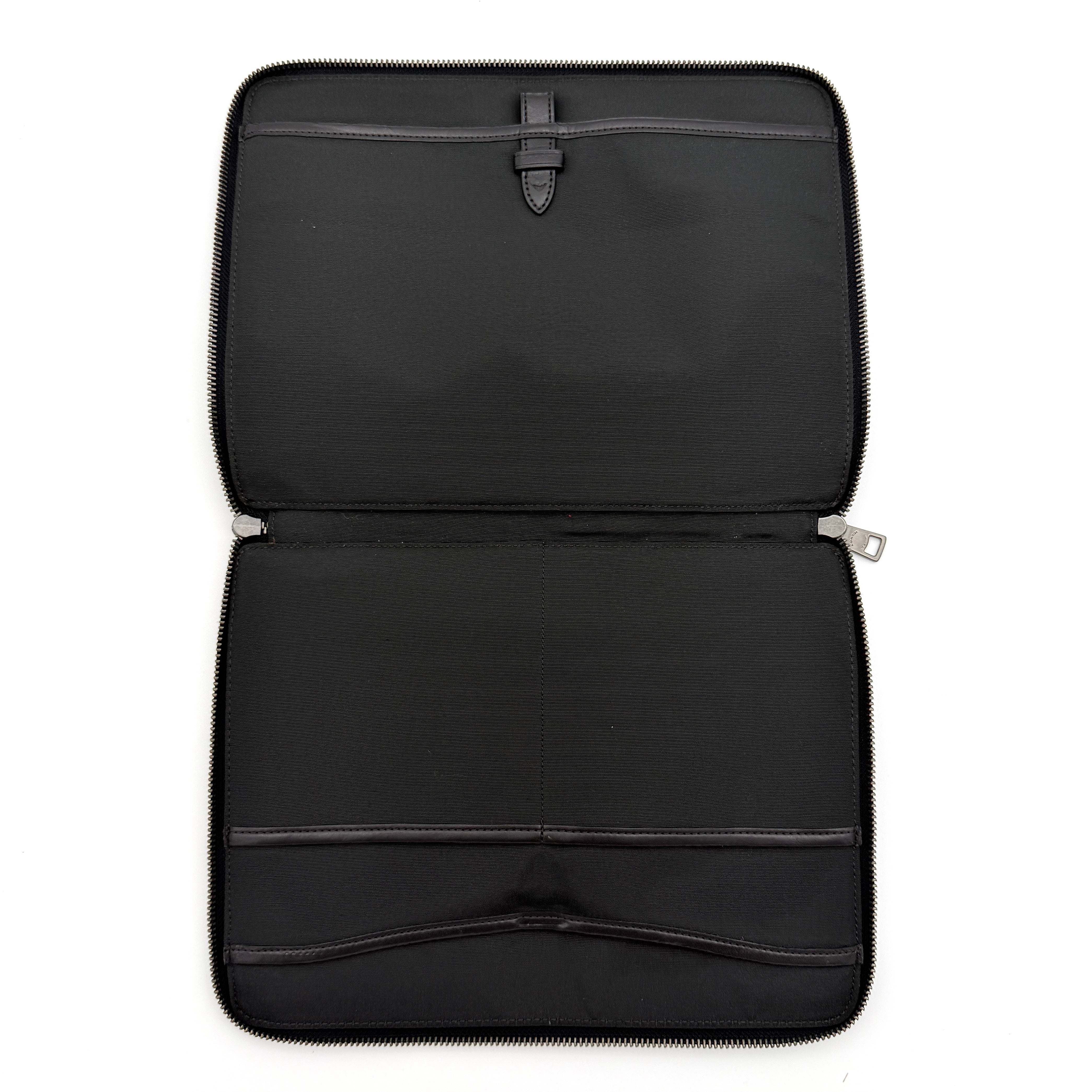 Coach Signature Zip Portfolio in brown and black coated canvas with black leather trim and silver tone double zip closure.