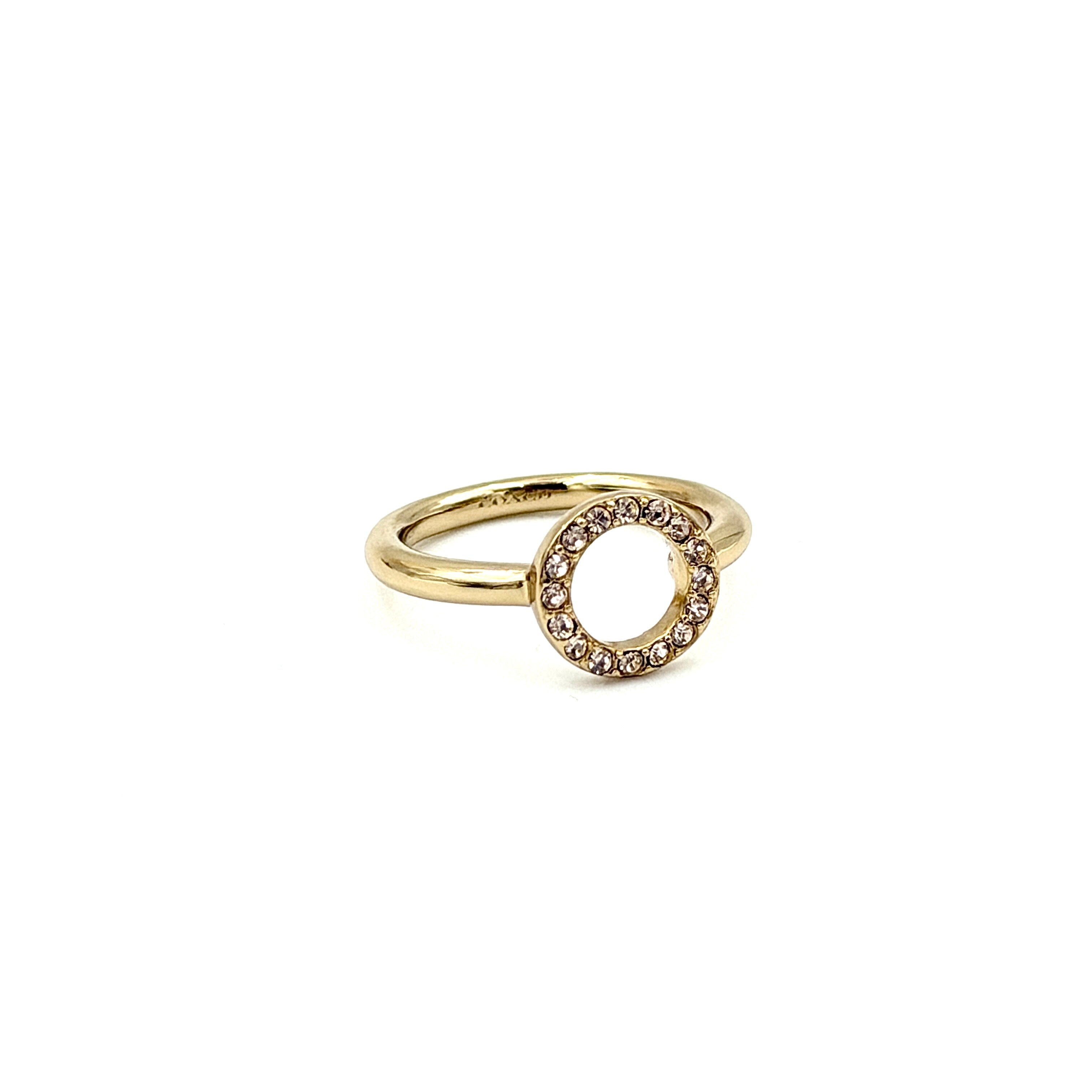 Coach Halo Crystal Ring in gold with a sparkling crystal-studded open circle on a polished gold band.