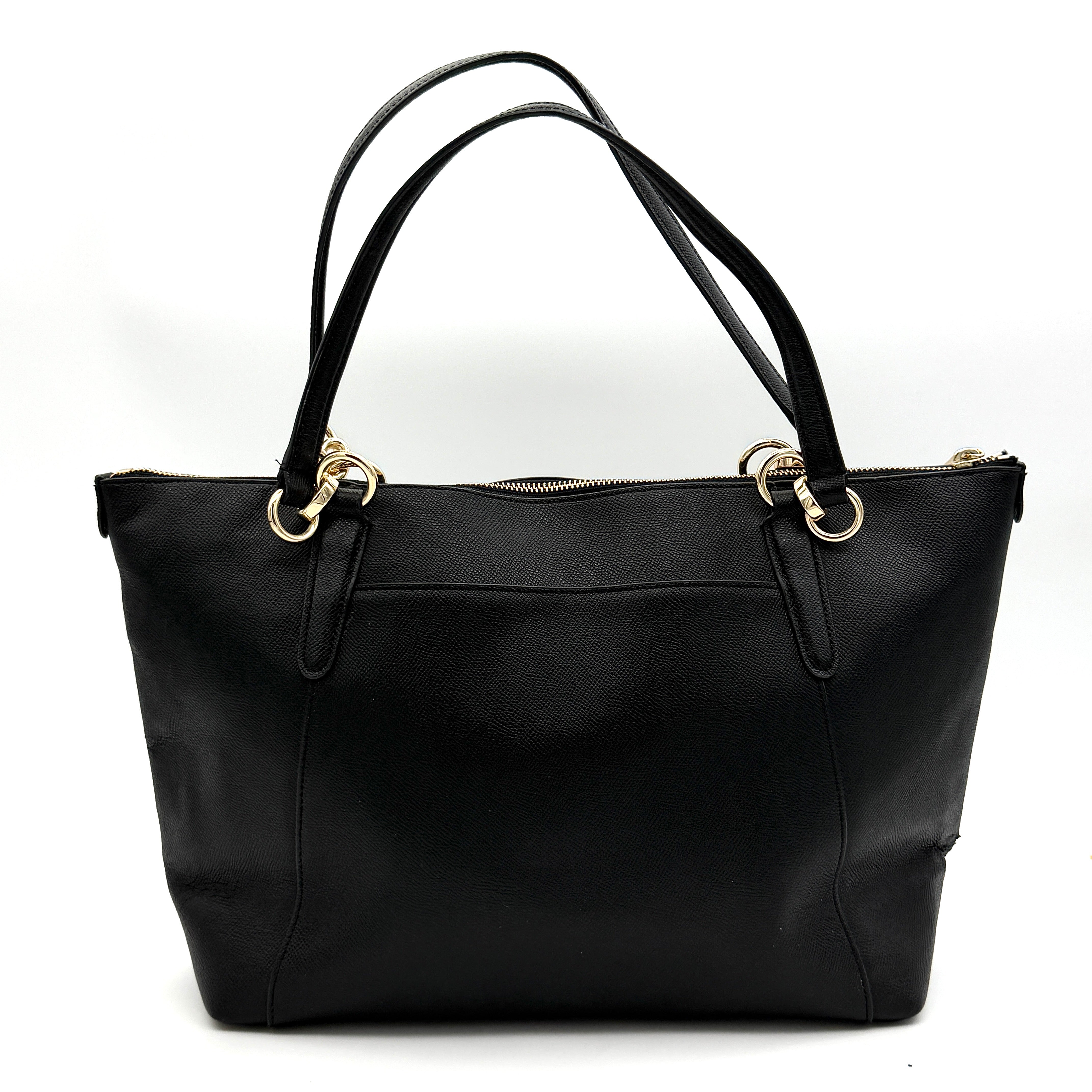Coach Ava Leather Tote Bag in black pebbled leather with gold-tone hardware and dual top handles.