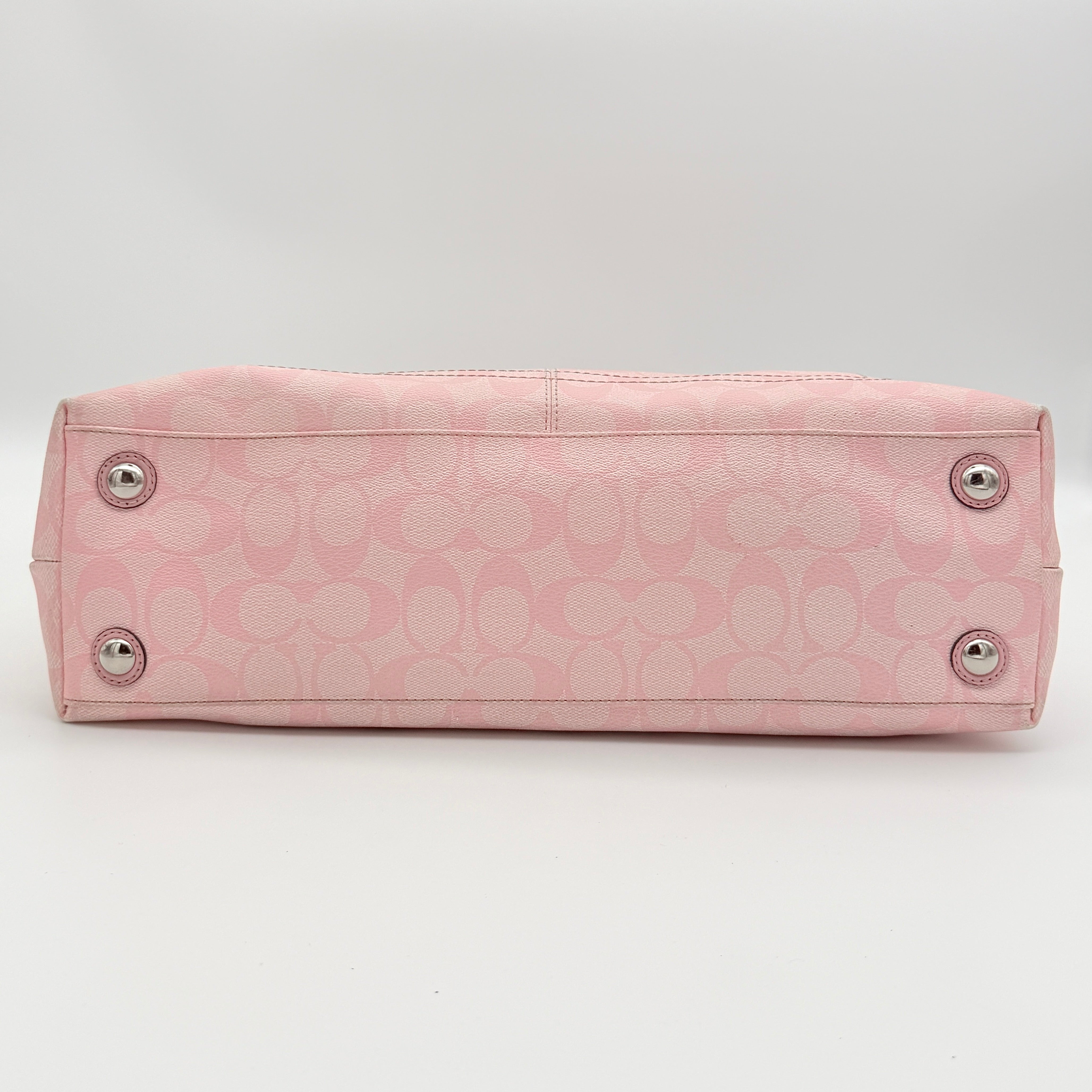 Coach Signature Penelope Shoulder Bag in pastel pink jacquard canvas with leather trim and silver-tone hardware.