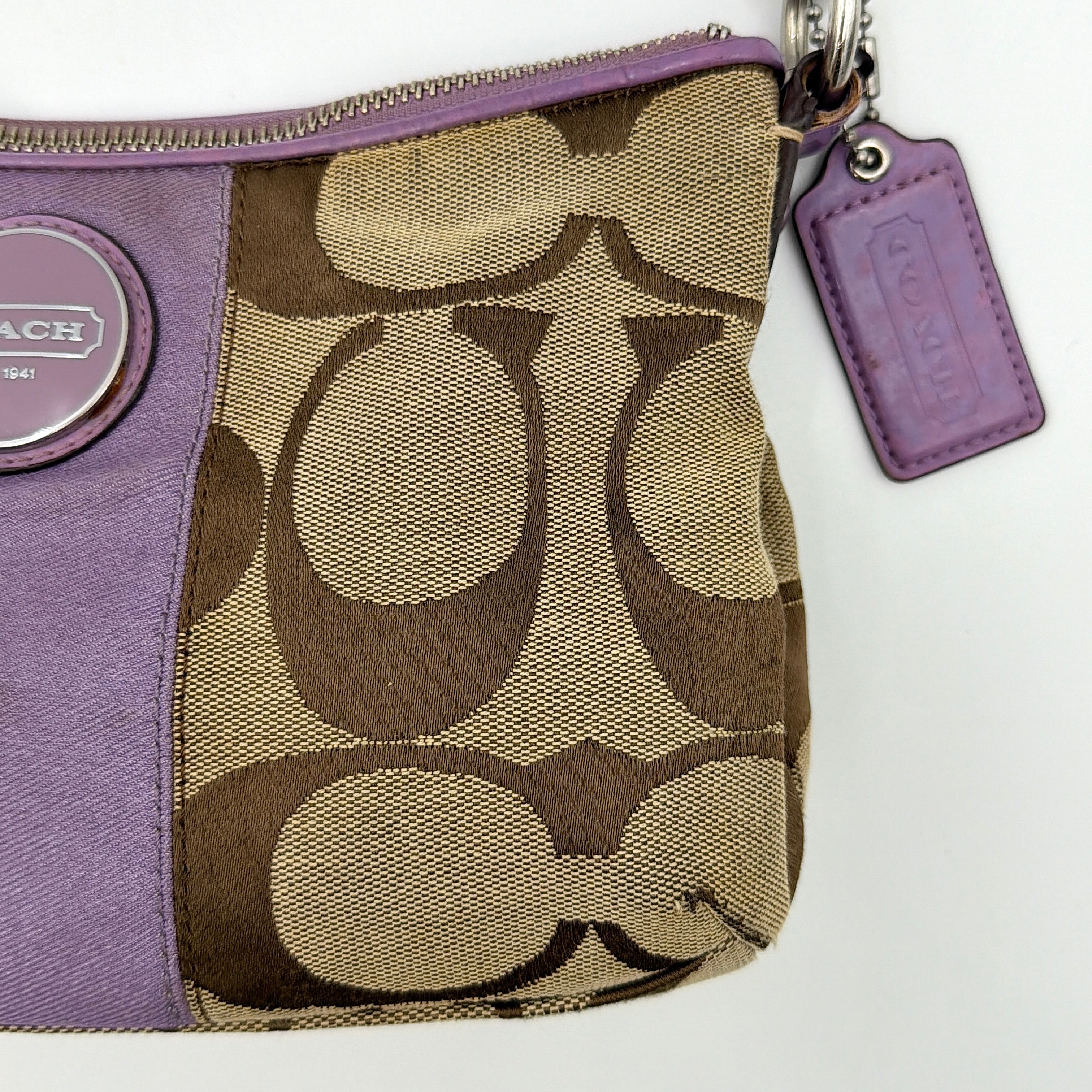 Coach 2Way Signature Shoulder Bag in beige jacquard with purple leather accents and silver hardware, shown with both short handle and detachable long strap.