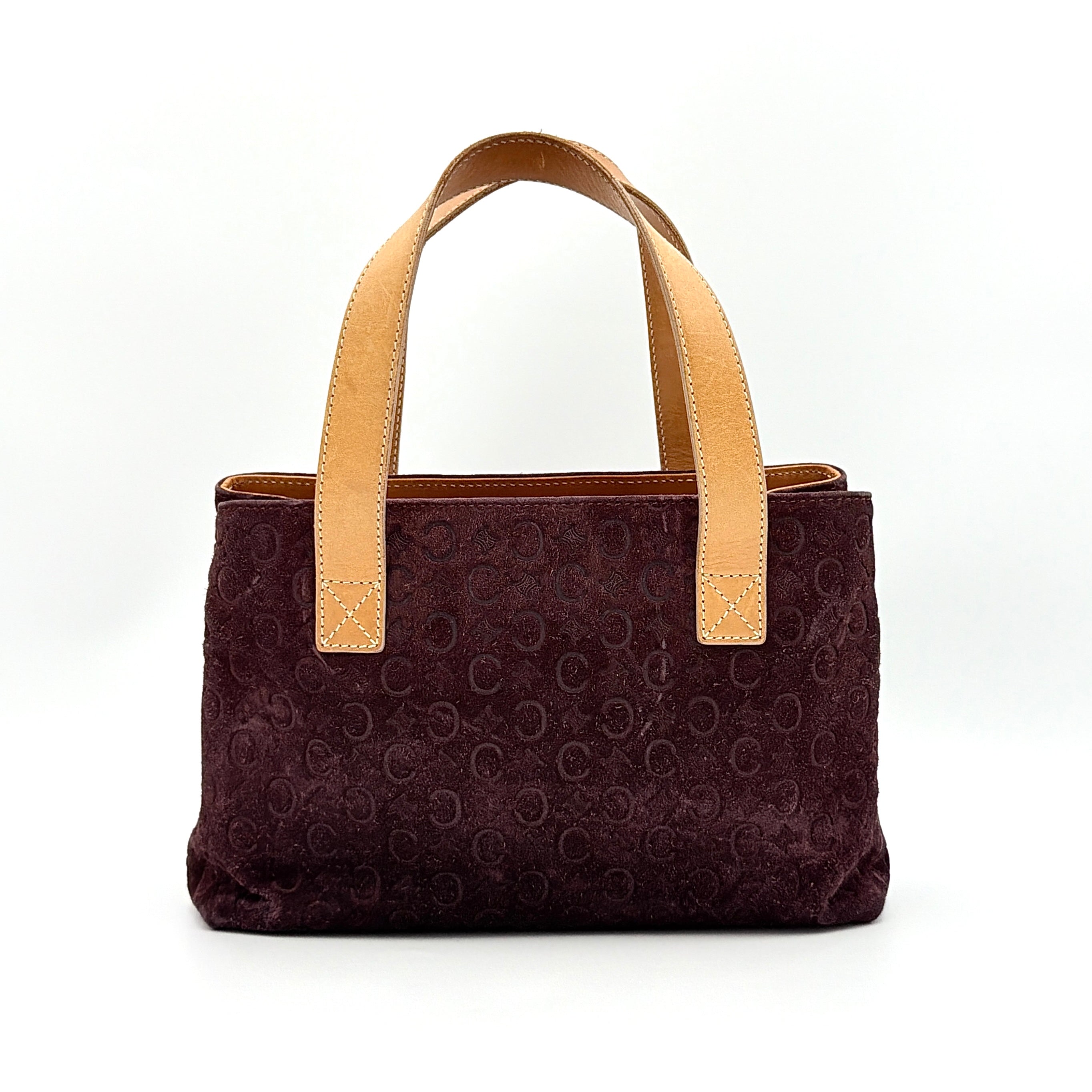 Celine C Macadam Shoulder Bag in rich brown embossed suede with tan leather handles, showcased against a plain background.