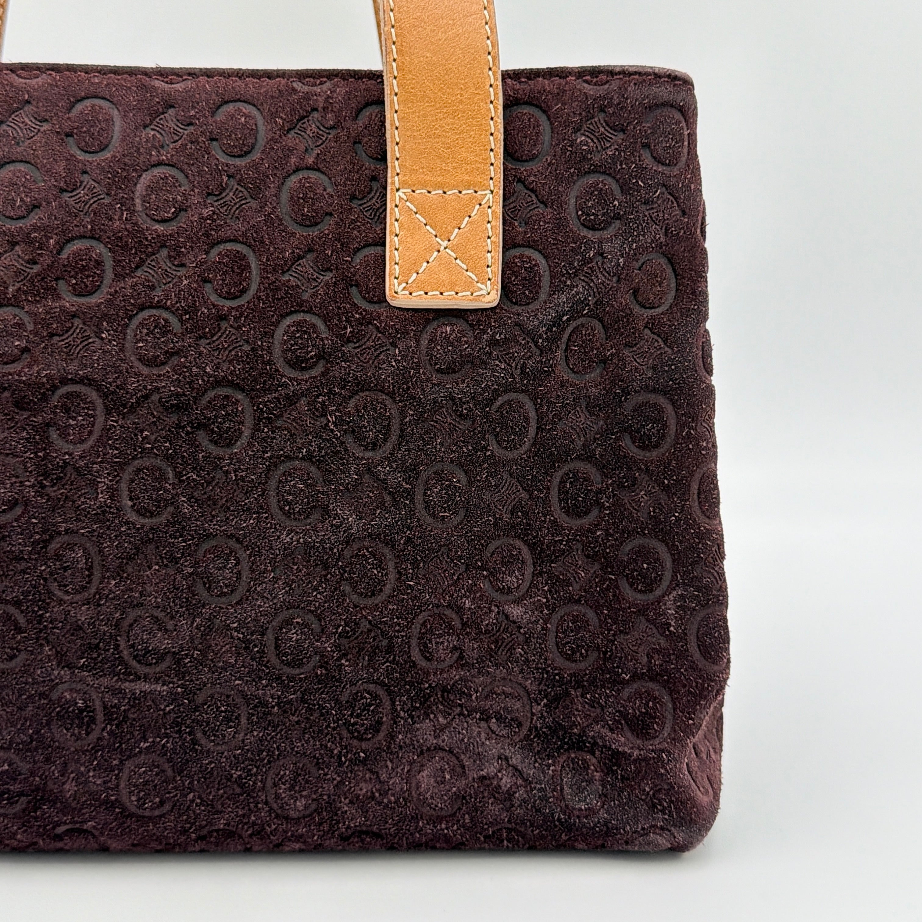 Celine C Macadam Shoulder Bag in rich brown embossed suede with tan leather handles, showcased against a plain background.