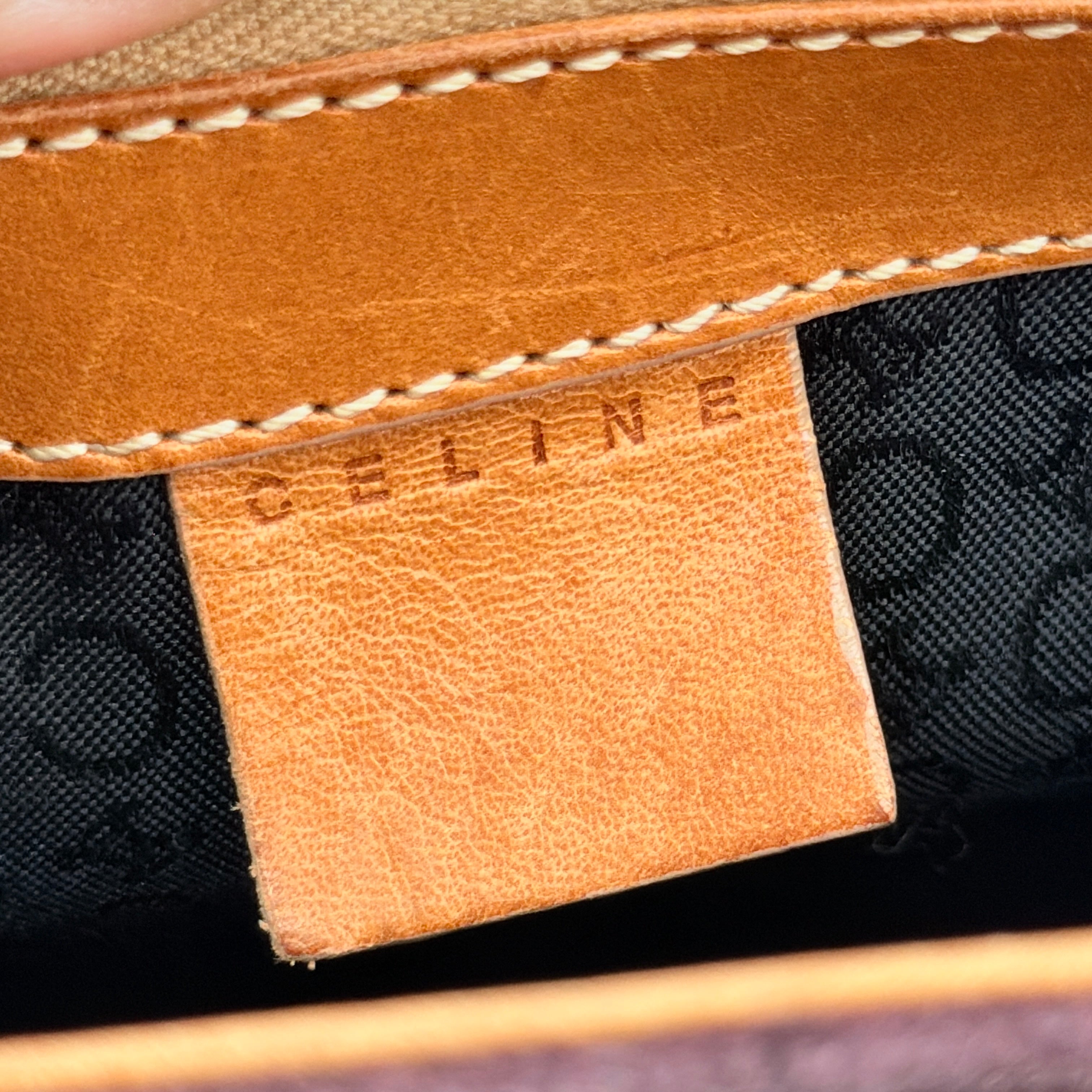Celine C Macadam Shoulder Bag in rich brown embossed suede with tan leather handles, showcased against a plain background.