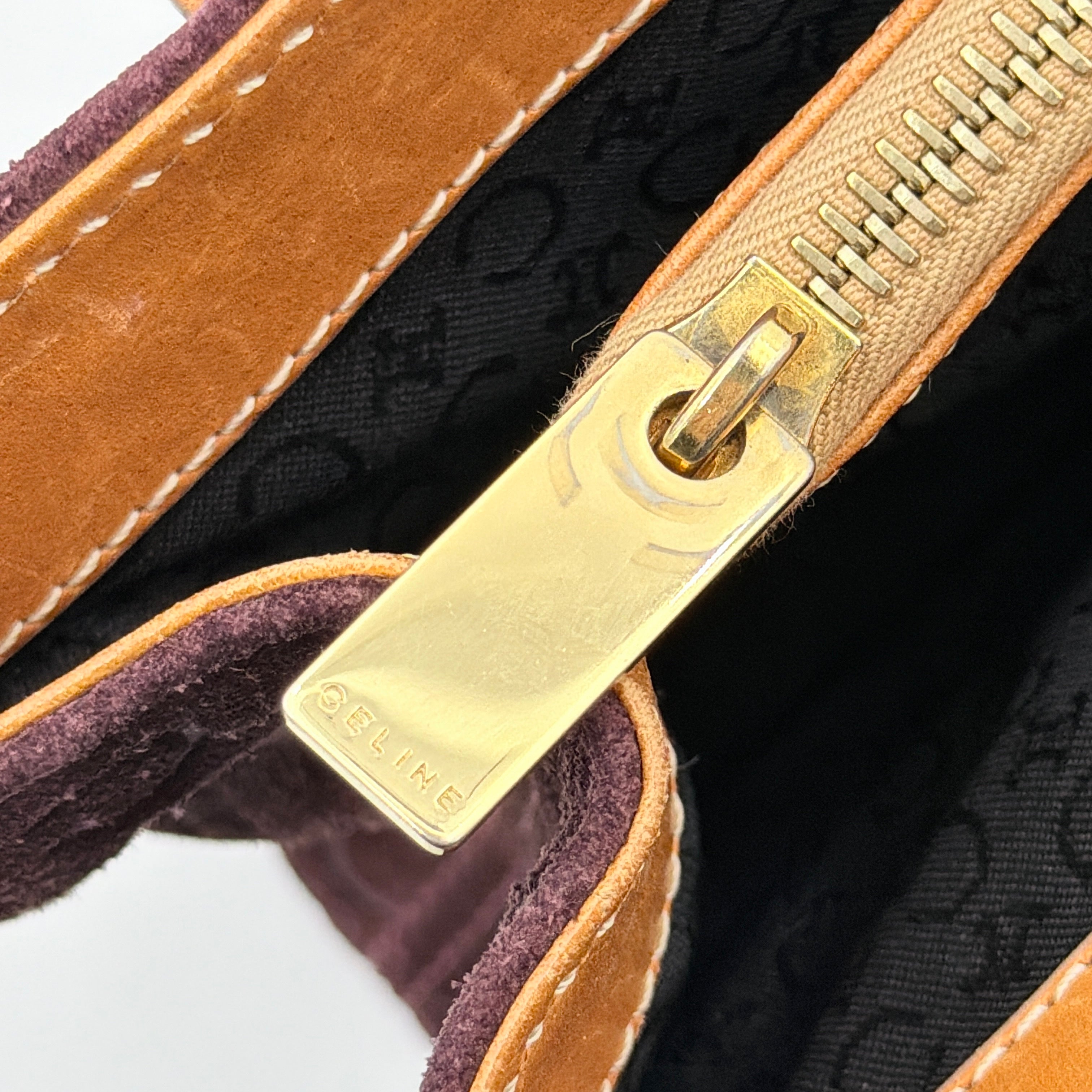 Celine C Macadam Shoulder Bag in rich brown embossed suede with tan leather handles, showcased against a plain background.