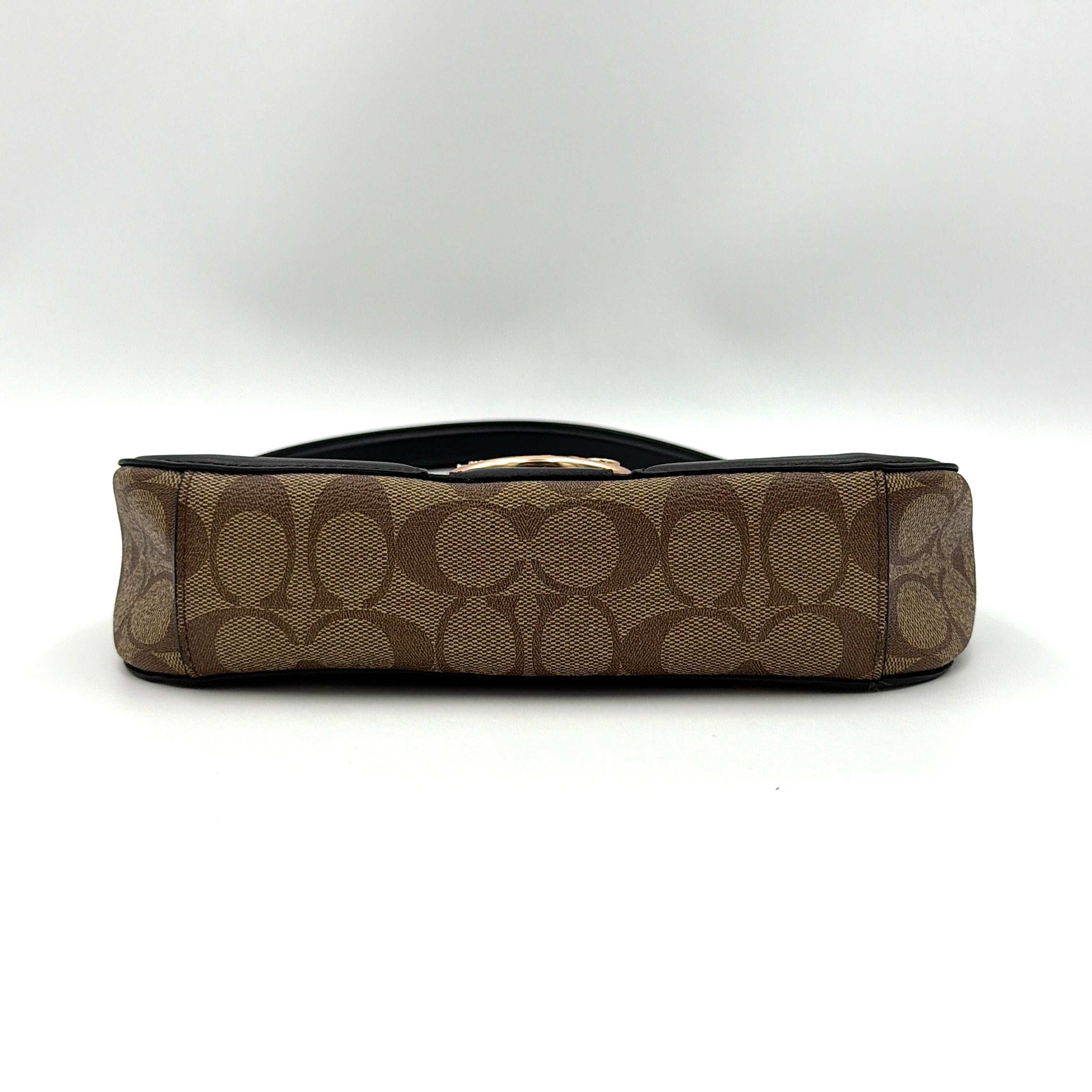 Coach Georgie Shoulder Bag in brown and black leopard print with gold horse and carriage medallion, displayed with its detachable chain and leather strap.
