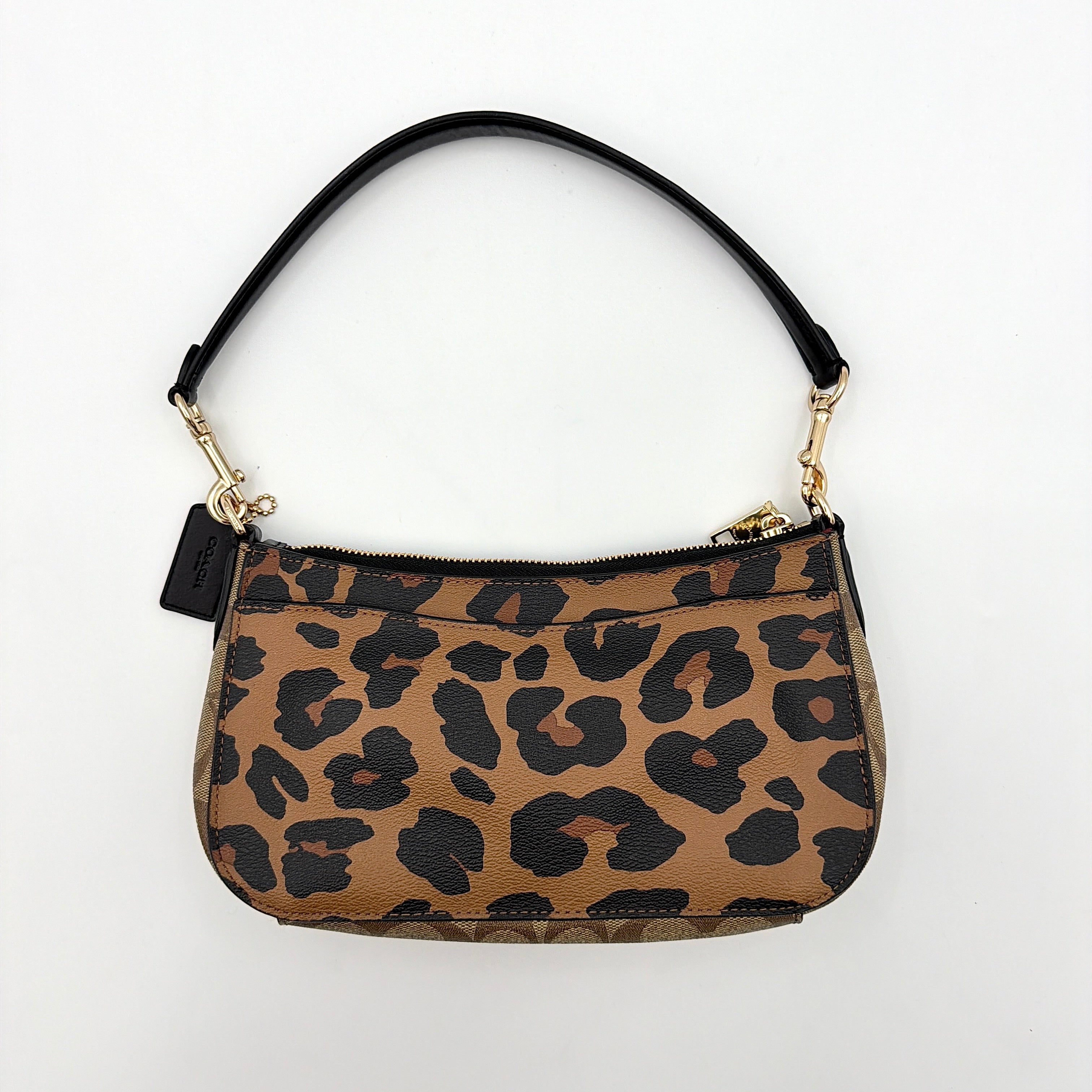Coach Georgie Shoulder Bag in brown and black leopard print with gold horse and carriage medallion, displayed with its detachable chain and leather strap.