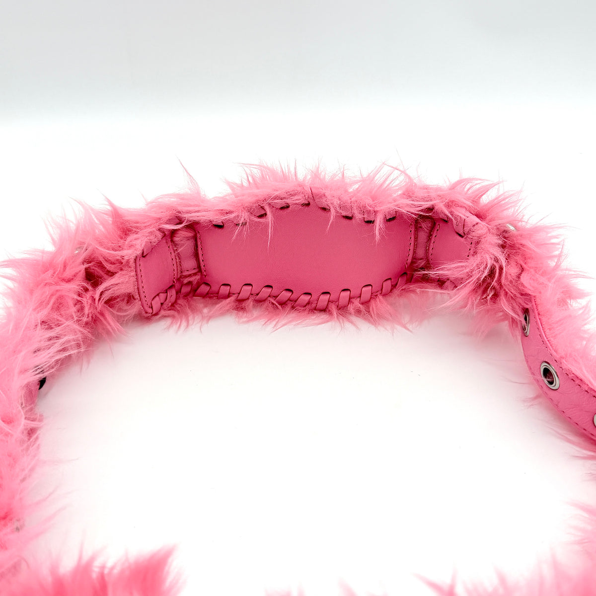 Balenciaga XS Le Cagole Shoulder Bag in sweet pink faux fur with heart-shaped mirror charm and silver hardware, styled on its original dust bag.