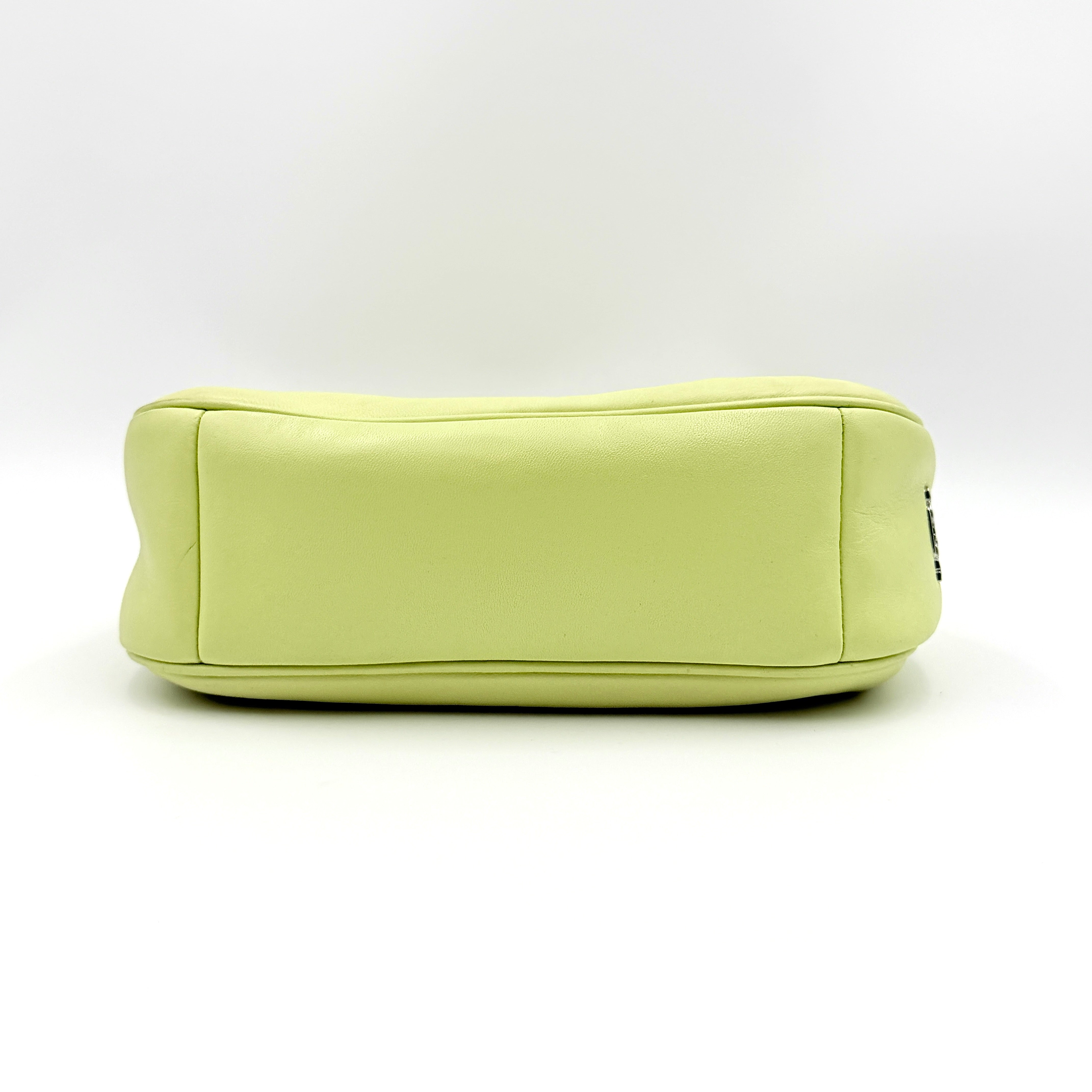Coach 2Way C Teri Quilted Shoulder Bag in pastel green leather with oversized chain handle and detachable strap, displayed against a clean background.