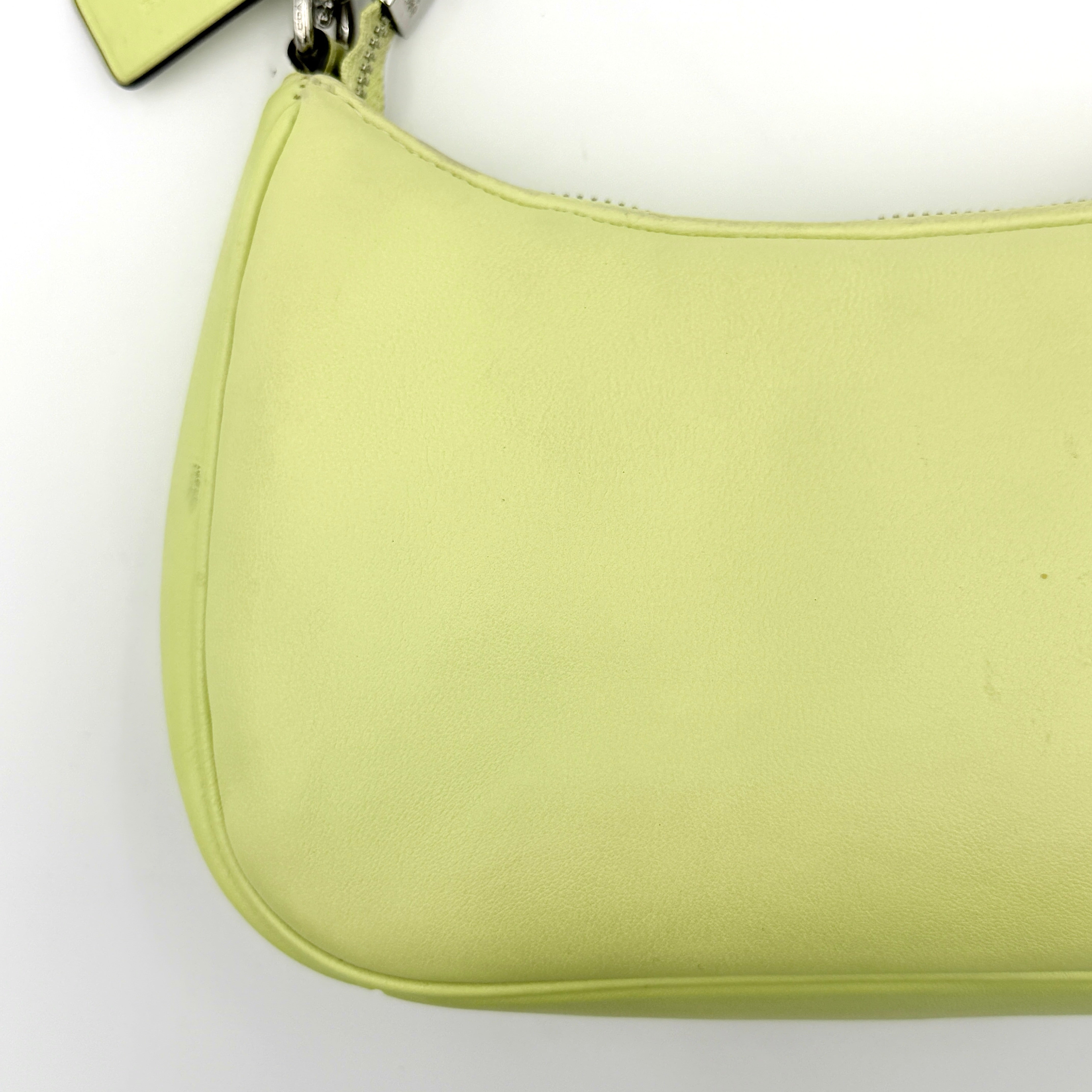Coach 2Way C Teri Quilted Shoulder Bag in pastel green leather with oversized chain handle and detachable strap, displayed against a clean background.