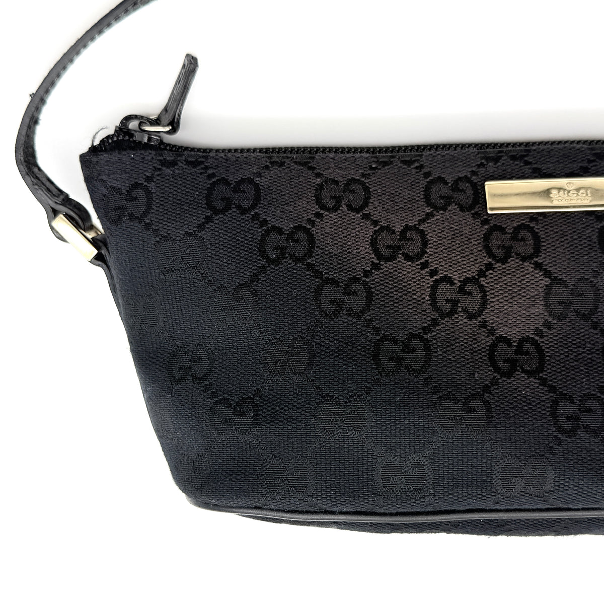 Gucci GG Monogram Pochette Boat Shoulder Bag in black GG jacquard with gold-tone hardware and black leather trim displayed with dust bag.