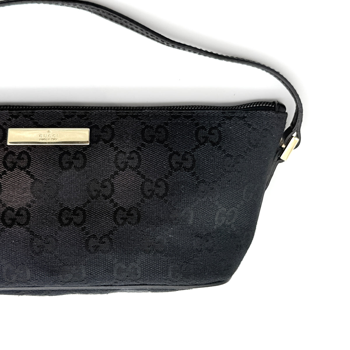 Gucci GG Monogram Pochette Boat Shoulder Bag in black GG jacquard with gold-tone hardware and black leather trim displayed with dust bag.