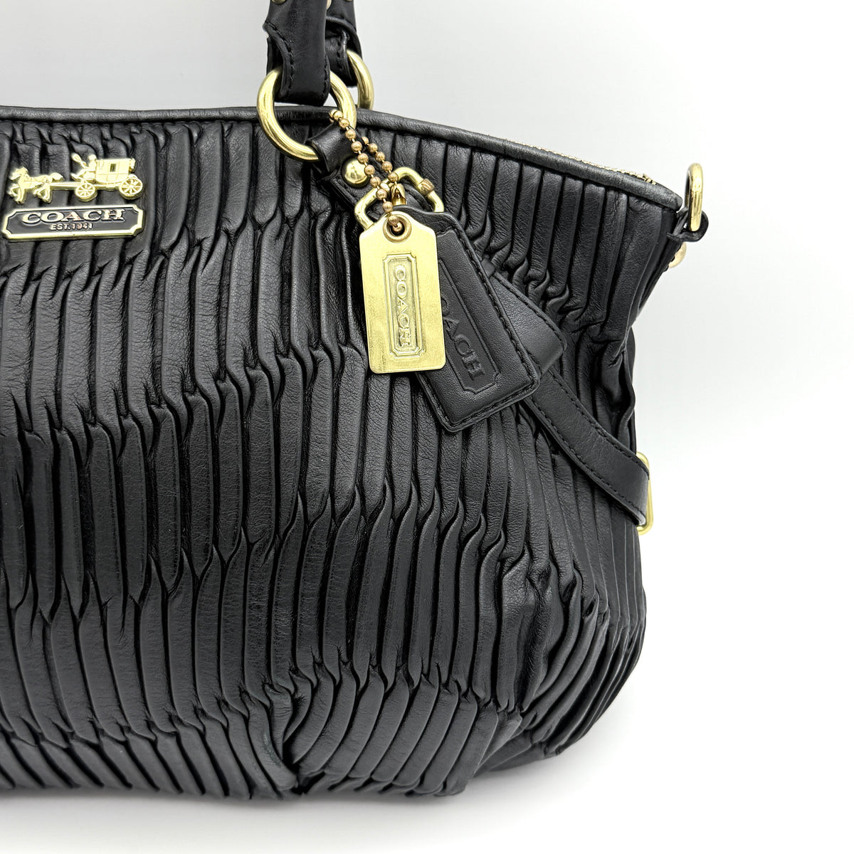 Coach Sophia Madison Pleated Shoulder Bag in black leather with gold hardware and detachable strap.