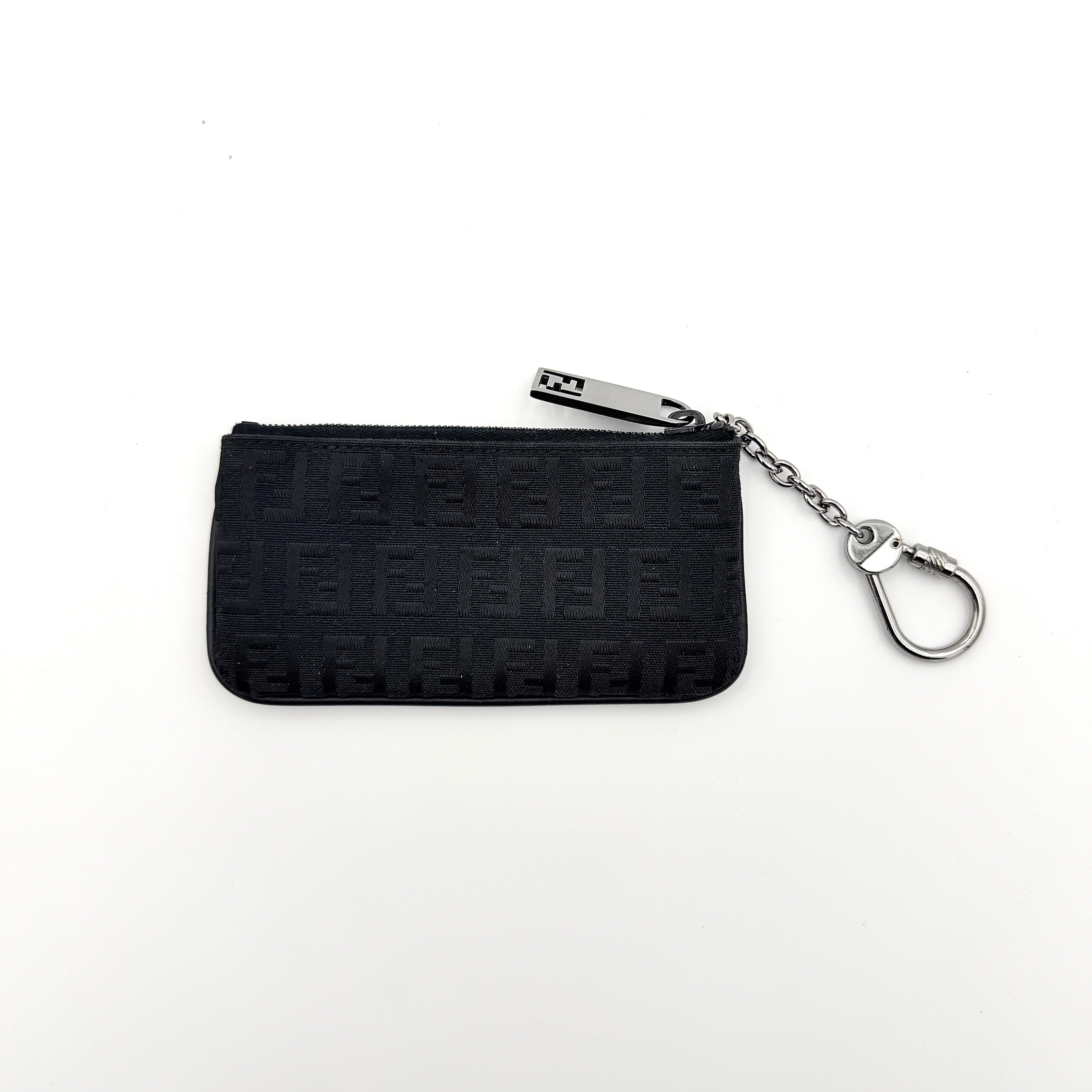 Fendi FF Zucca Coin Purse in black jacquard with iconic monogram pattern, silver-tone chain and carabiner detail.