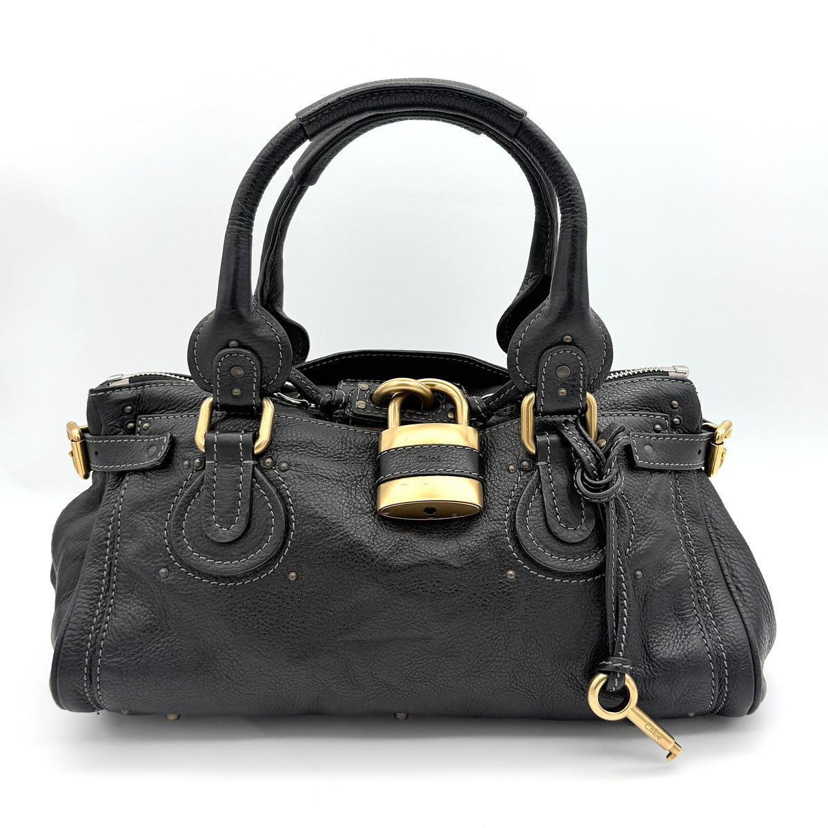 Front view of the Chloe Paddington Shoulder Bag in black leather with gold-tone hardware and signature padlock.