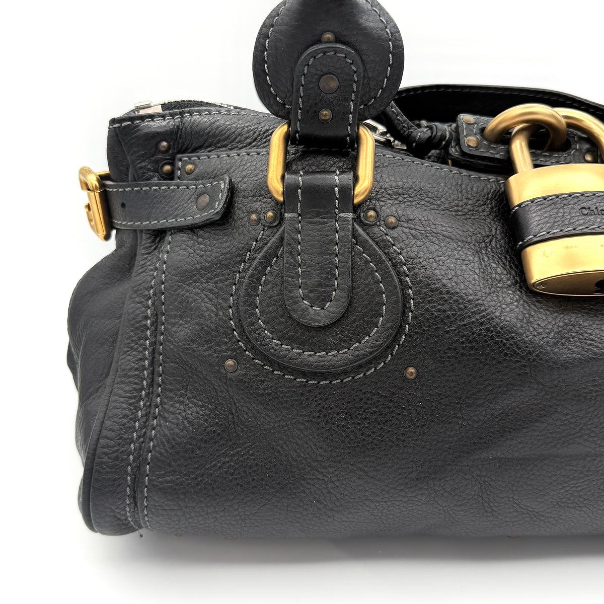 Front view of the Chloe Paddington Shoulder Bag in black leather with gold-tone hardware and signature padlock.