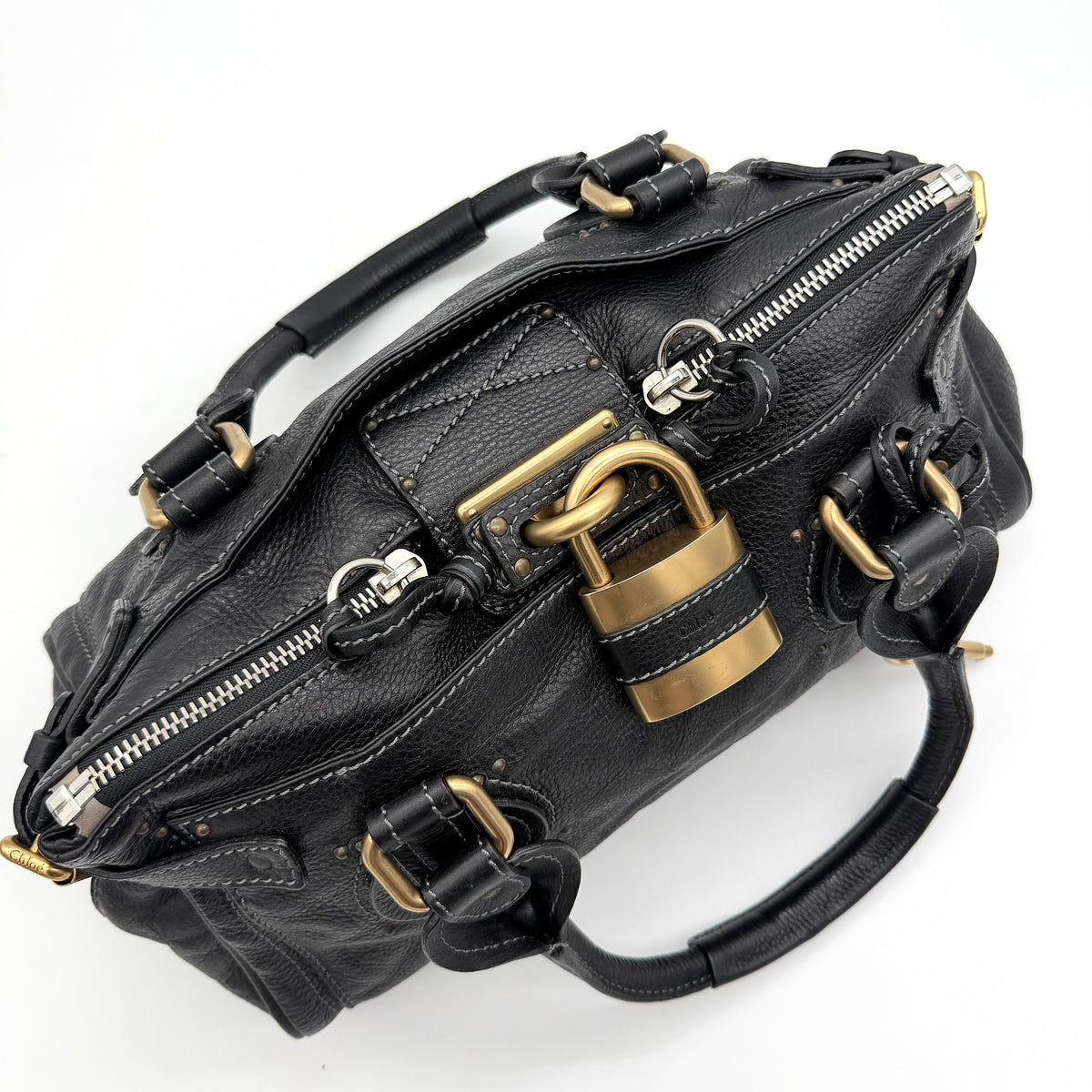Front view of the Chloe Paddington Shoulder Bag in black leather with gold-tone hardware and signature padlock.
