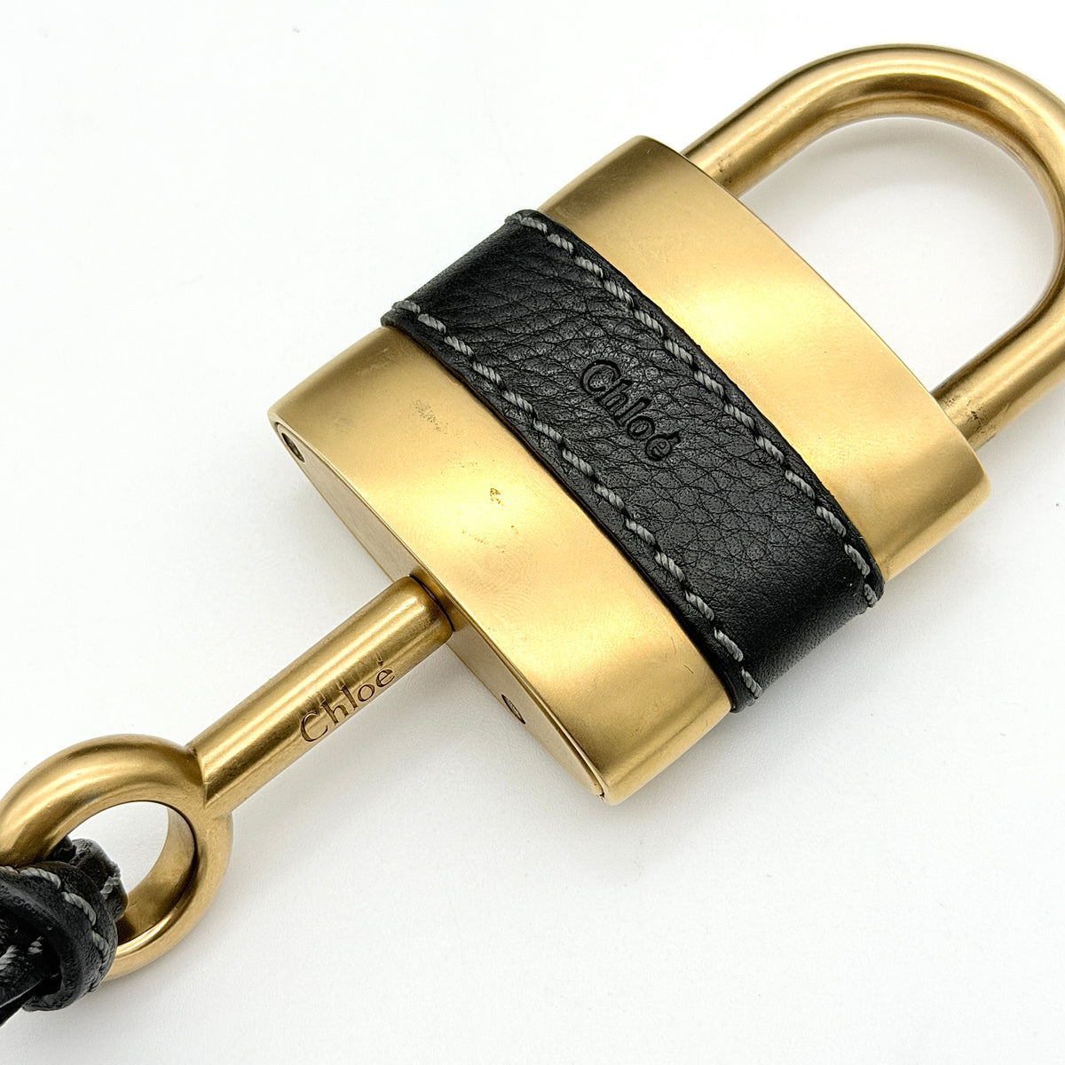 Front view of the Chloe Paddington Shoulder Bag in black leather with gold-tone hardware and signature padlock.