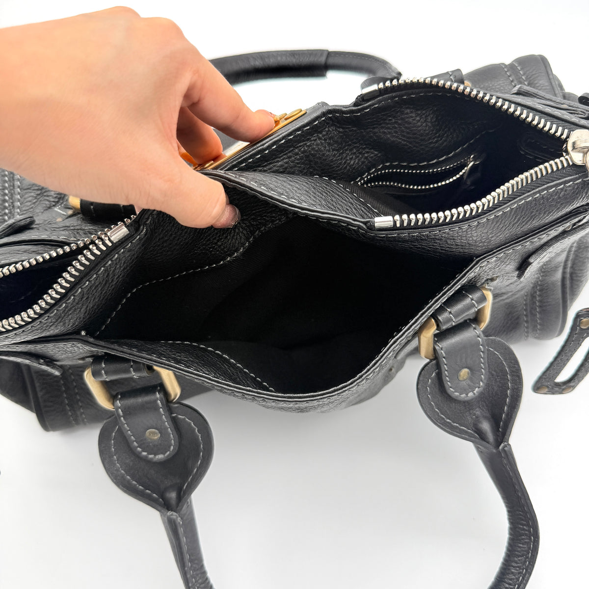Front view of the Chloe Paddington Shoulder Bag in black leather with gold-tone hardware and signature padlock.