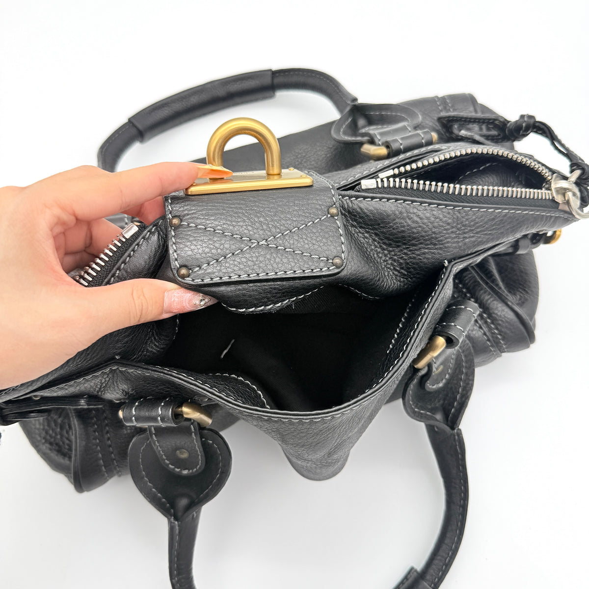 Front view of the Chloe Paddington Shoulder Bag in black leather with gold-tone hardware and signature padlock.