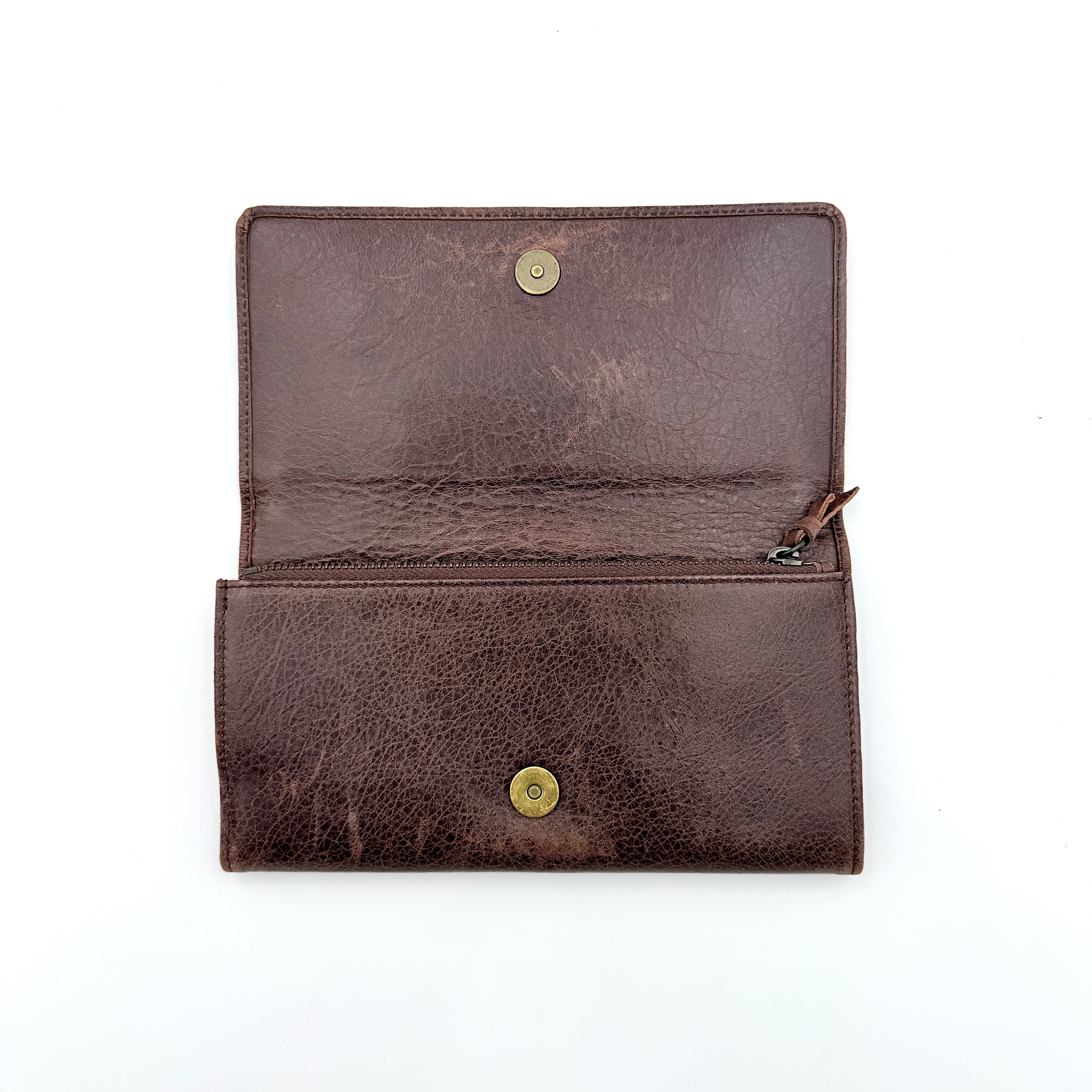 Balenciaga City Leather Long Wallet in brown distressed leather with signature buckle and zip detailing.