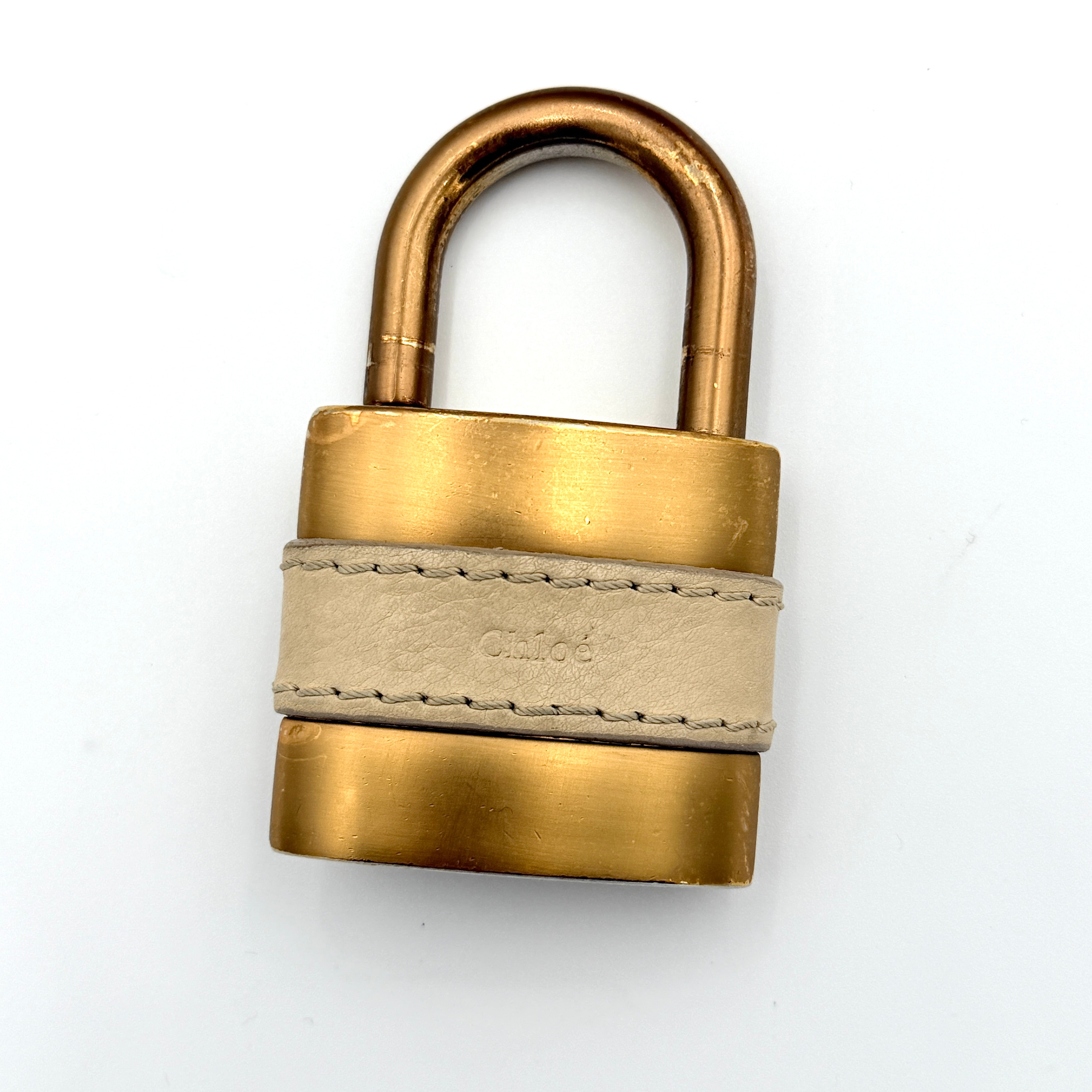 Chloé Paddington Shoulder Bag in ivory leather with signature brass padlock and double rolled handles.