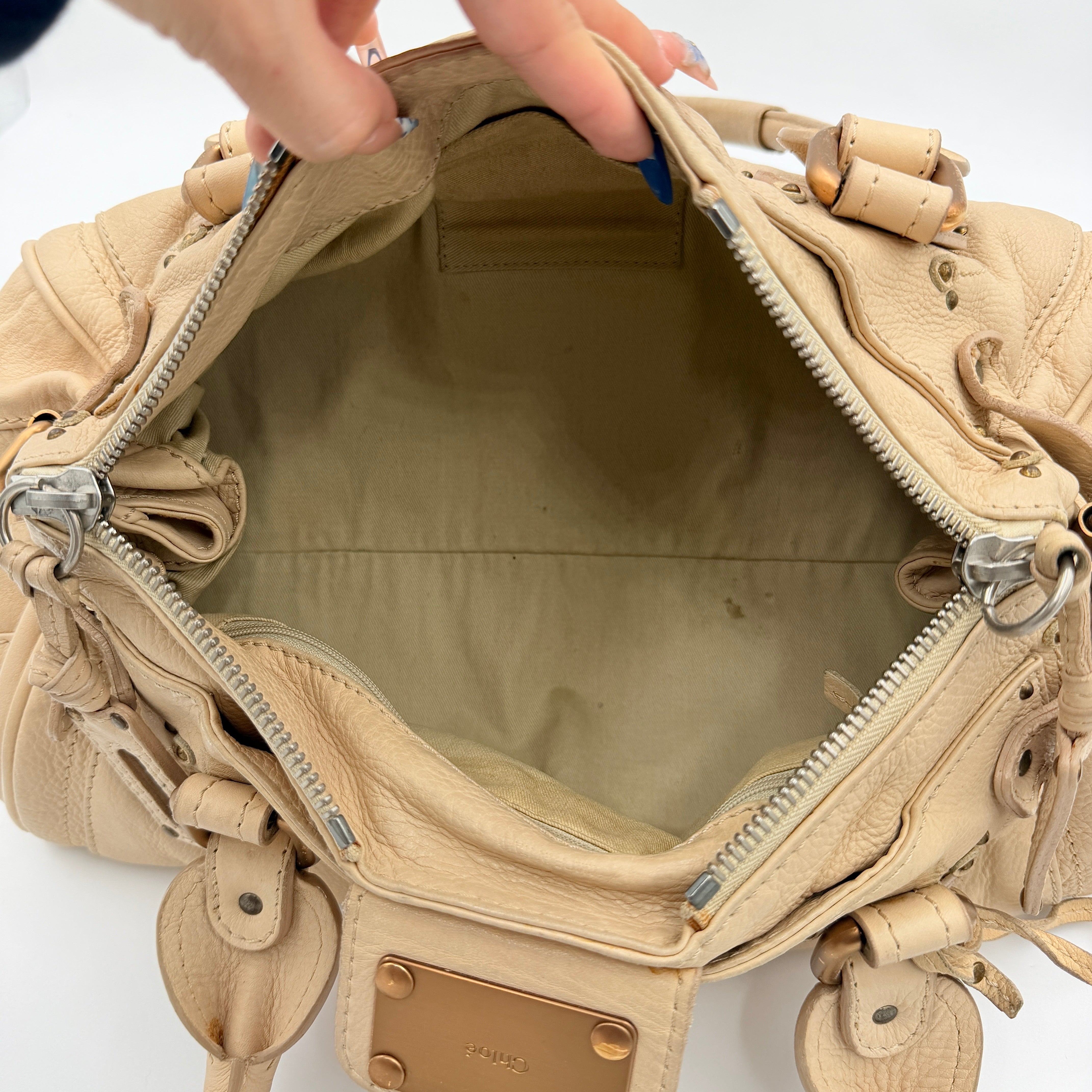 Chloé Paddington Shoulder Bag in ivory leather with signature brass padlock and double rolled handles.