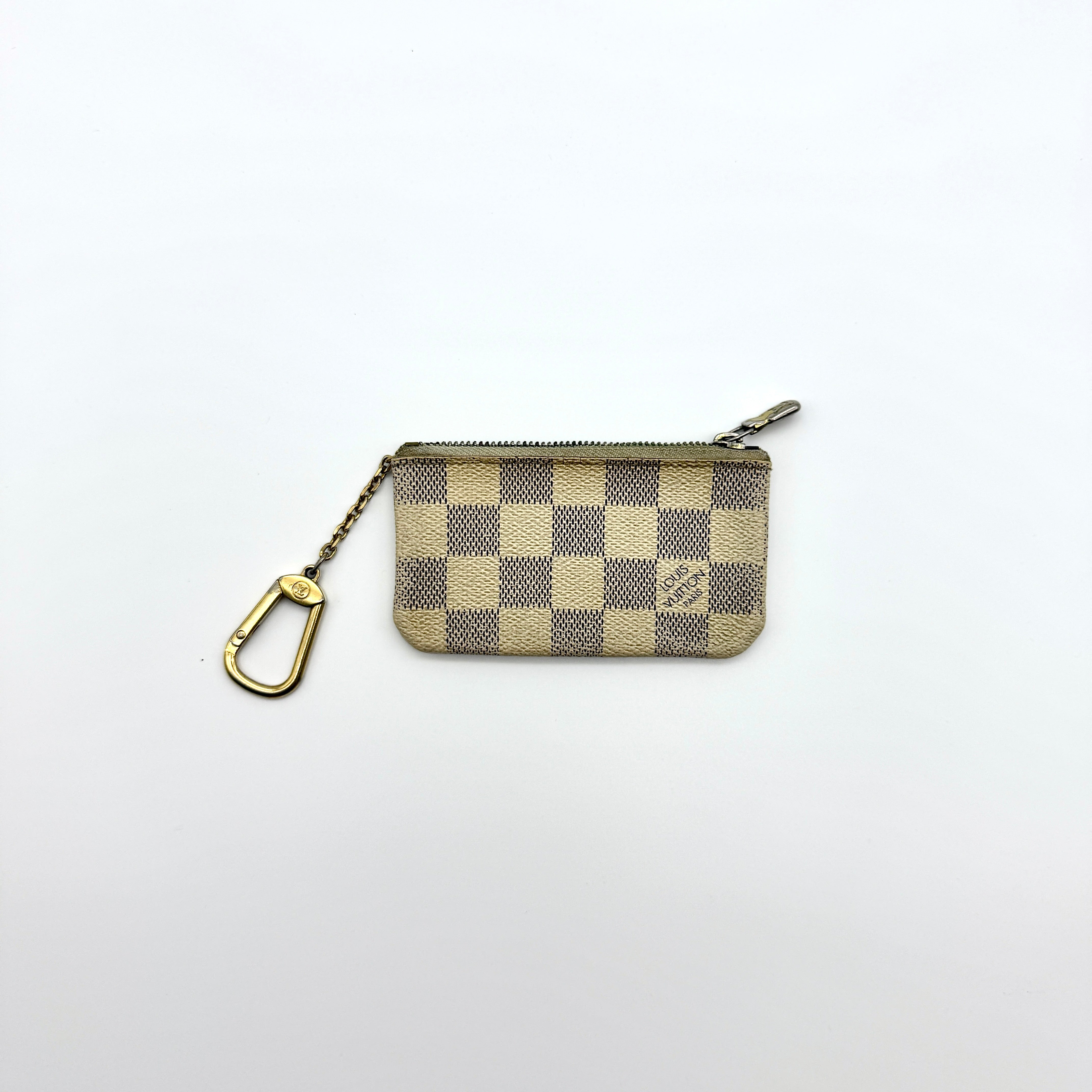 Louis Vuitton Damier Azur Coin Purse in white and blue coated canvas with gold-tone chain clasp — pre-loved.