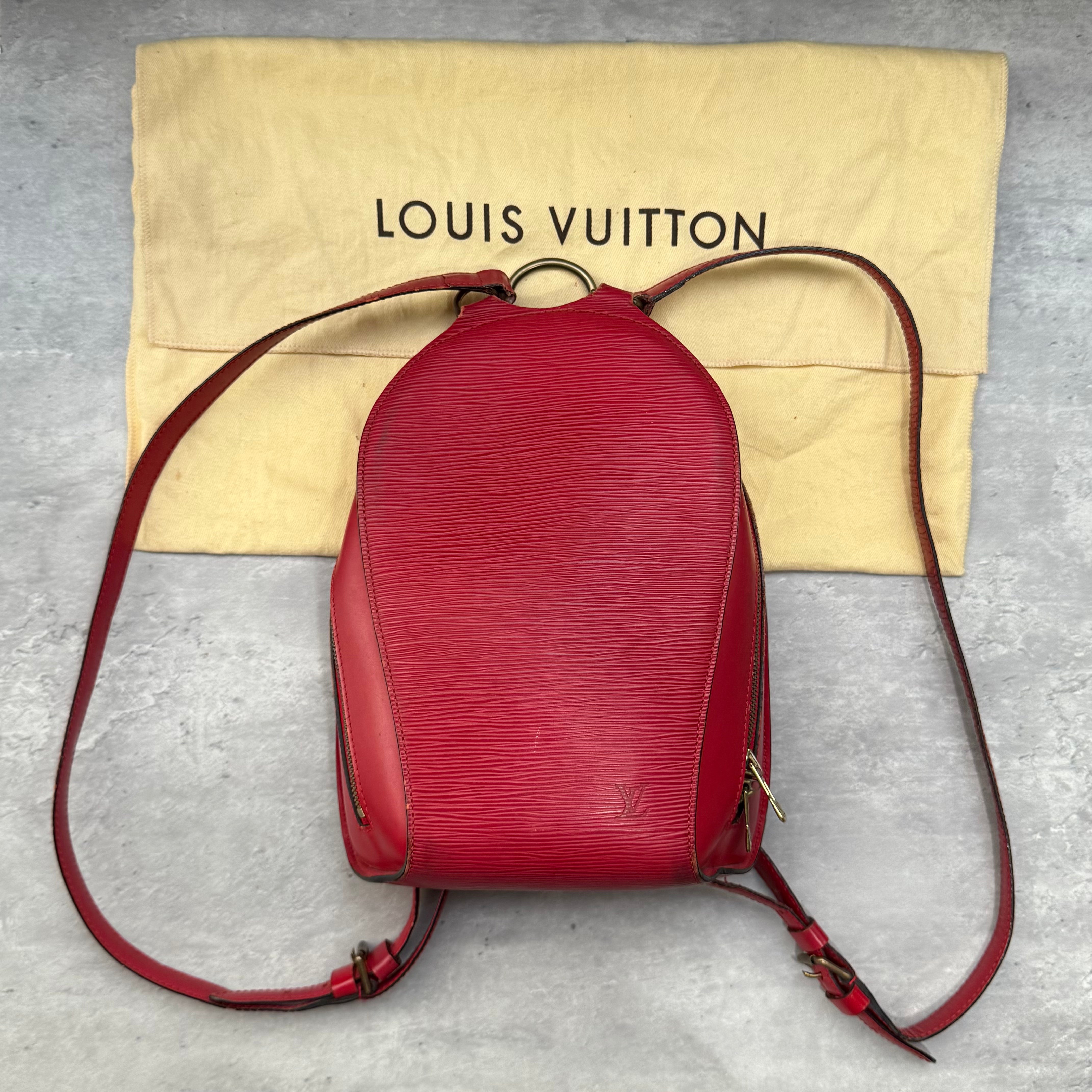 Louis Vuitton Epi Mabillon Backpack in red textured leather with gold-tone hardware and adjustable straps.