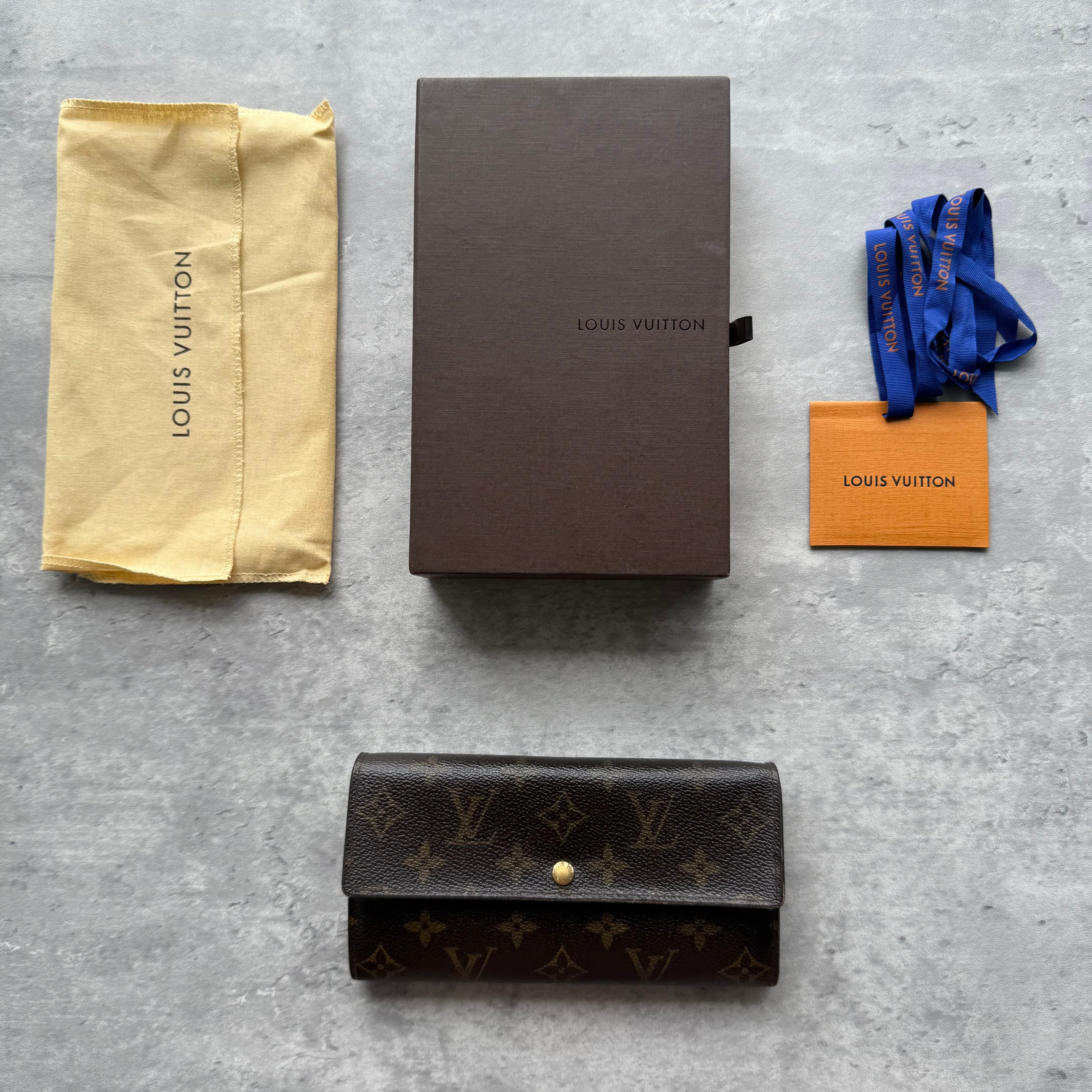 Louis Vuitton Sarah Long Wallet in Monogram canvas with envelope flap, gold-tone snap button, card slots, and zip coin pocket.