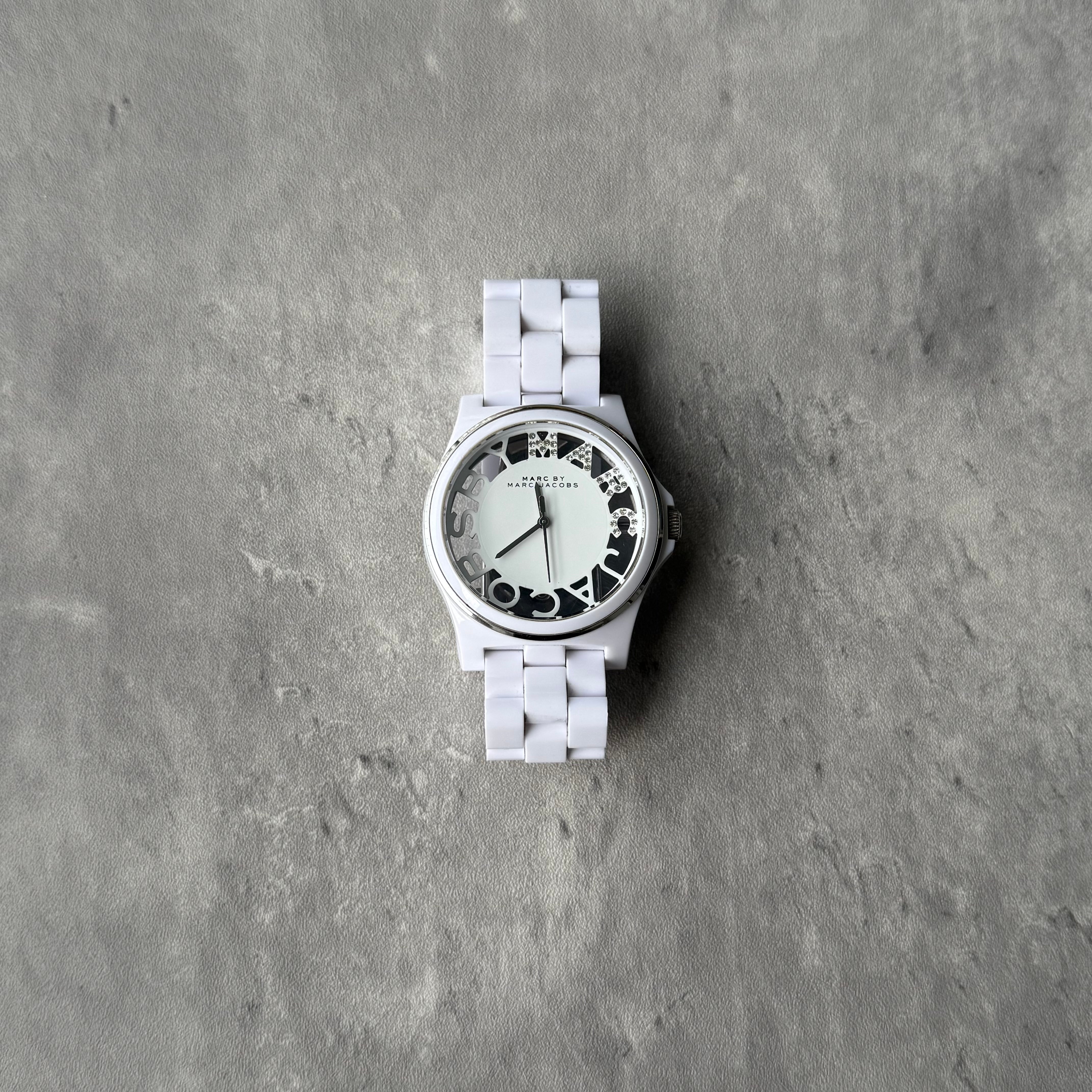 Marc Jacobs Henry Skeleton Crystal Watch in white with resin link bracelet, skeleton-style dial, crystal accents, and quartz movement.