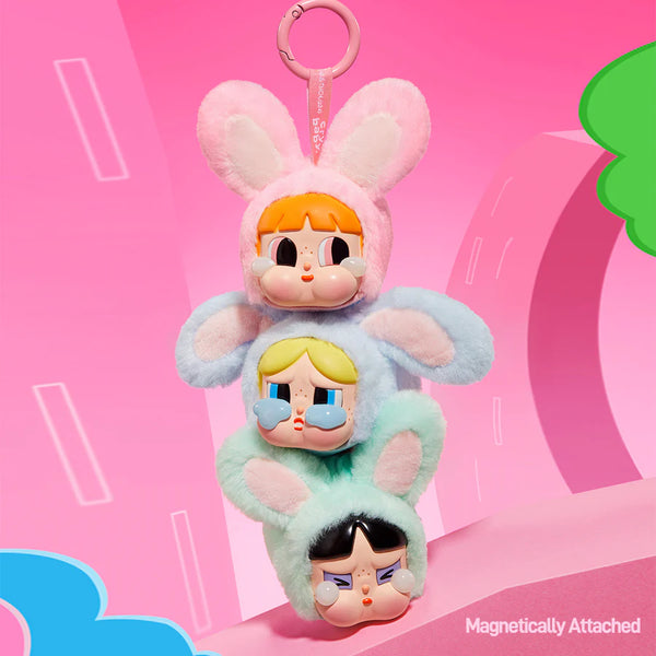 Powerpuff Girls Crybaby vinyl plush pendants by POP MART, featuring Blossom, Bubbles, and Buttercup in soft costumes with magnetic keyring attachments.